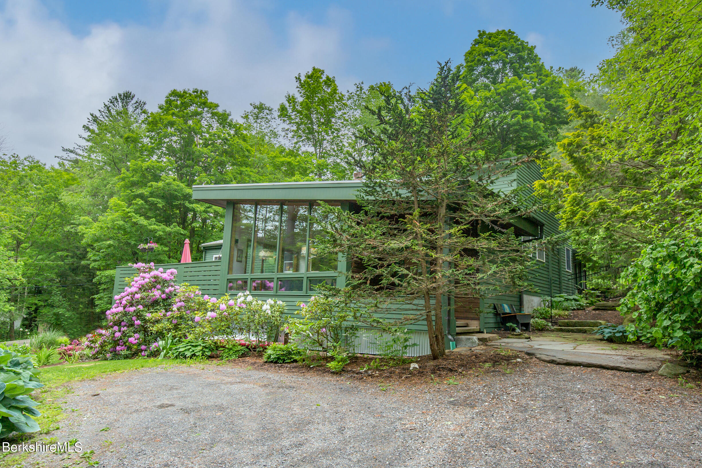 39 Lake Rd Extension Richmond, MA 01201 - Photo 2 of 47 a front view of a house with a yard