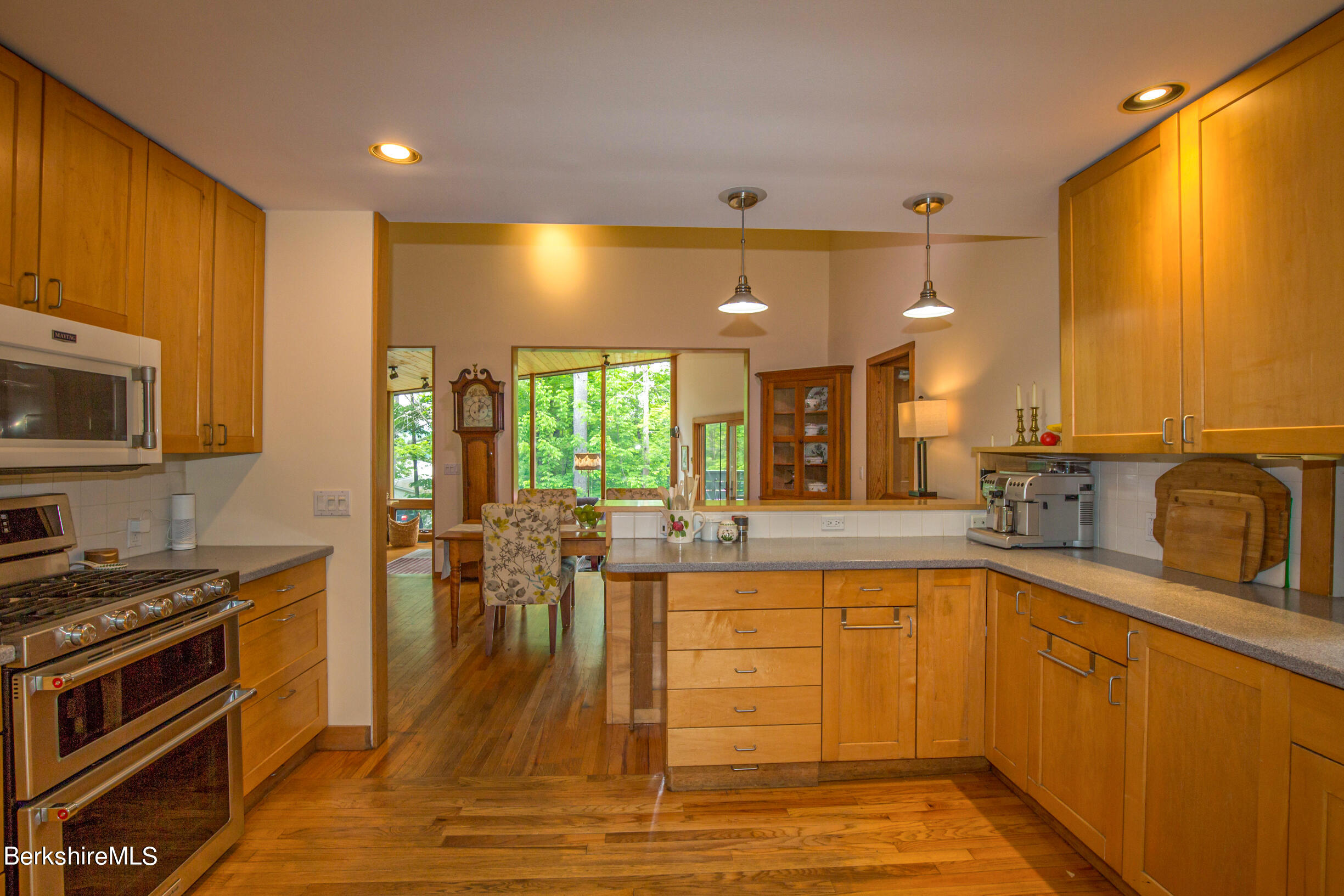 39 Lake Rd Extension Richmond, MA 01201 - Photo 21 of 47 a kitchen with lots of counter top space and stainless steel appliances