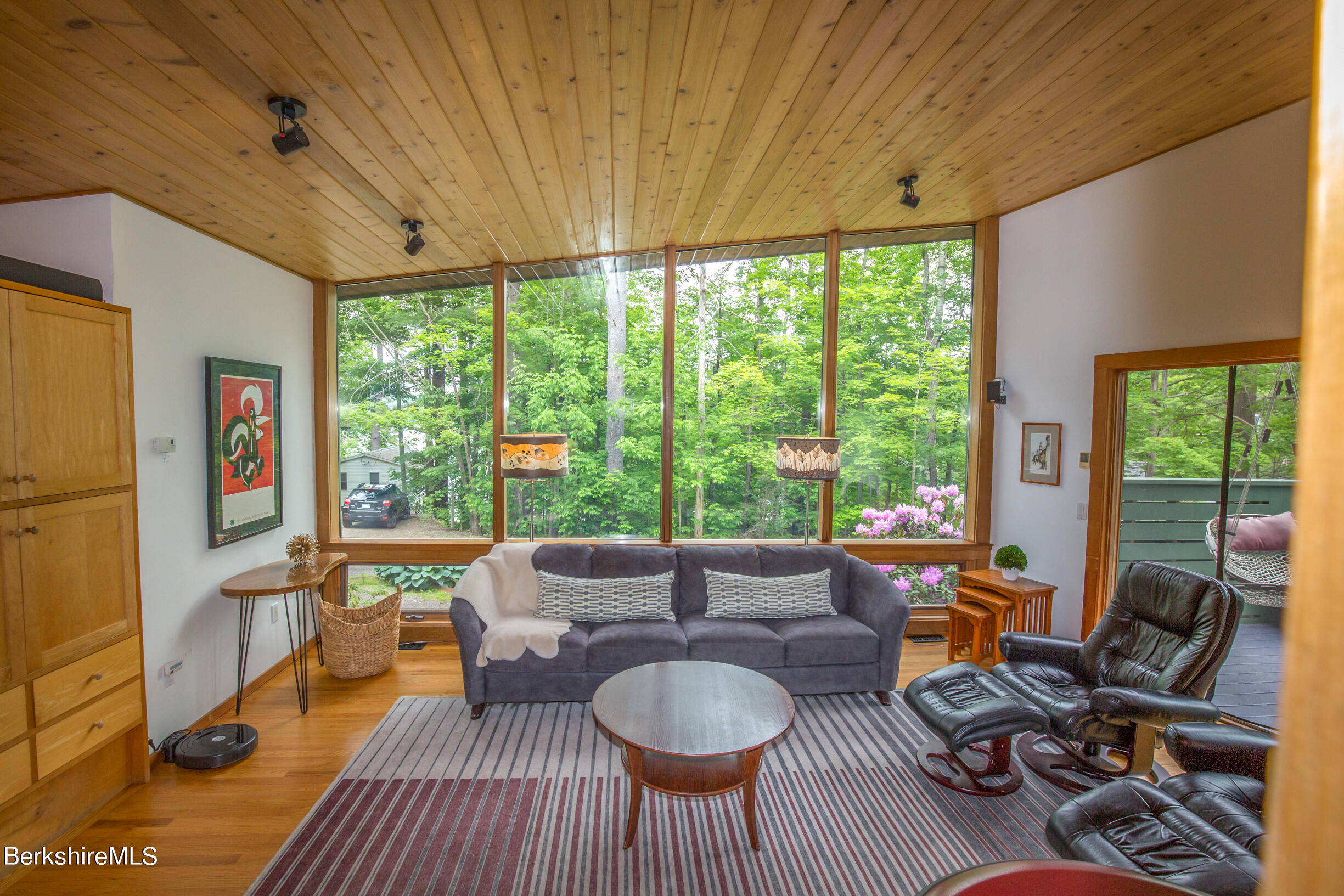 39 Lake Rd Extension Richmond, MA 01201 - Photo 37 of 47 a living room with furniture and a large window
