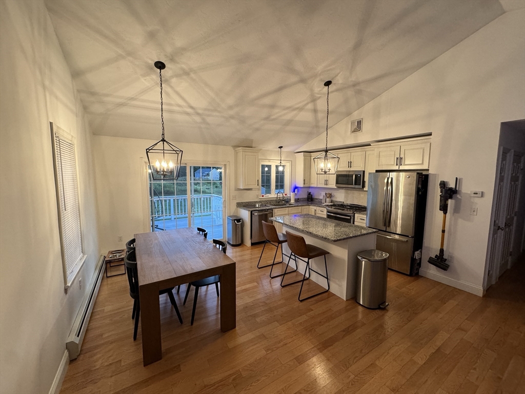 64 Town Farm Road Barre, MA 01005 - Photo 5 of 24 a view of a dining room with furniture window and wooden floor
