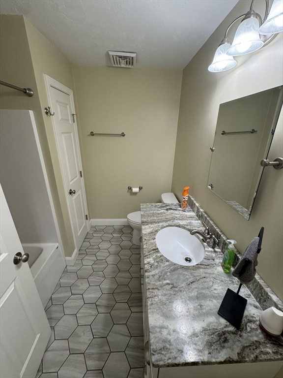 64 Town Farm Road Barre, MA 01005 - Photo 8 of 24 a bathroom with a granite countertop sink and a mirror