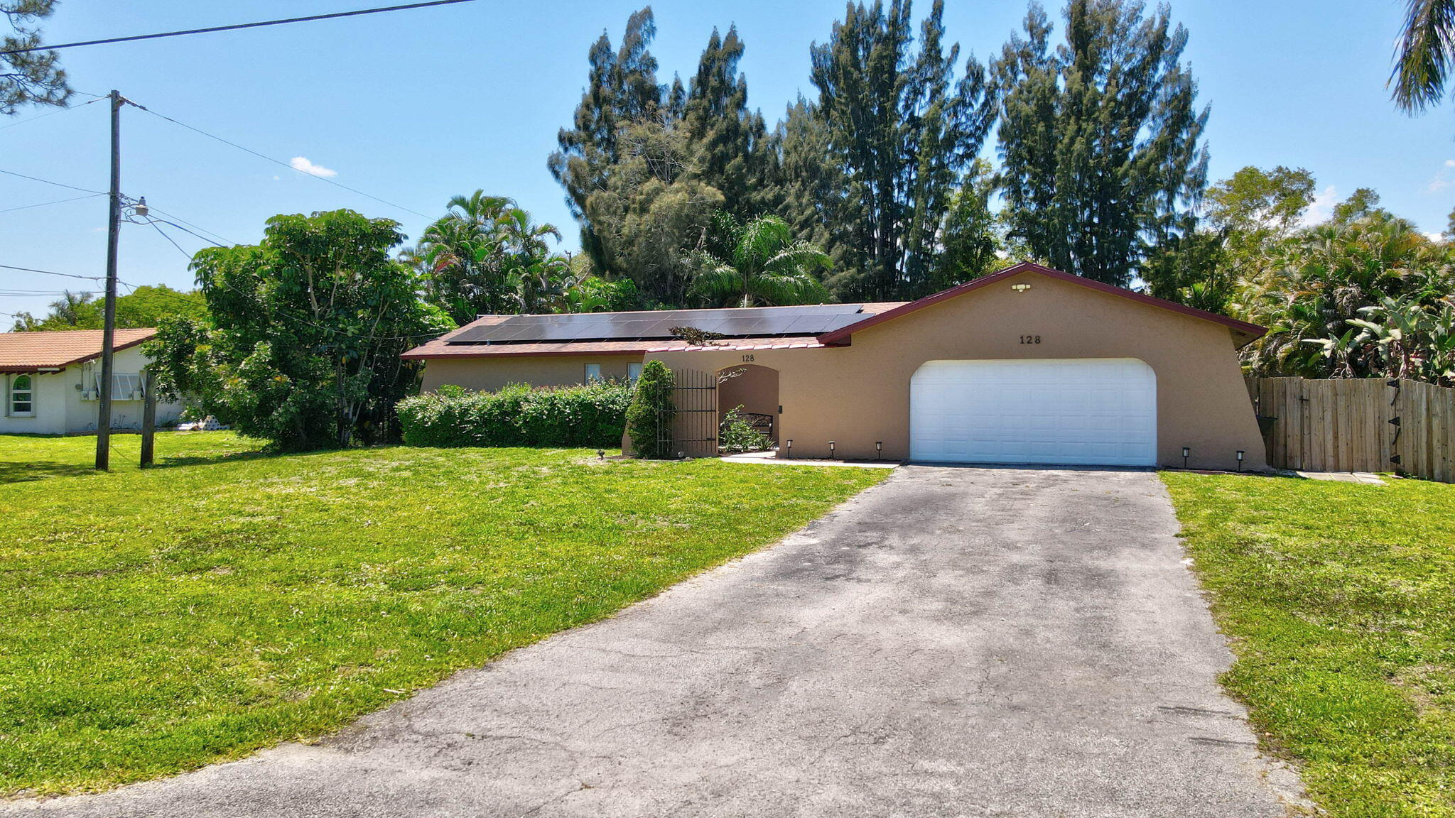 128 Barberton Road Lake Worth, FL 33467 - Photo 4 of 51 3-web-or-mls-DJI_0101_2_3_4_5