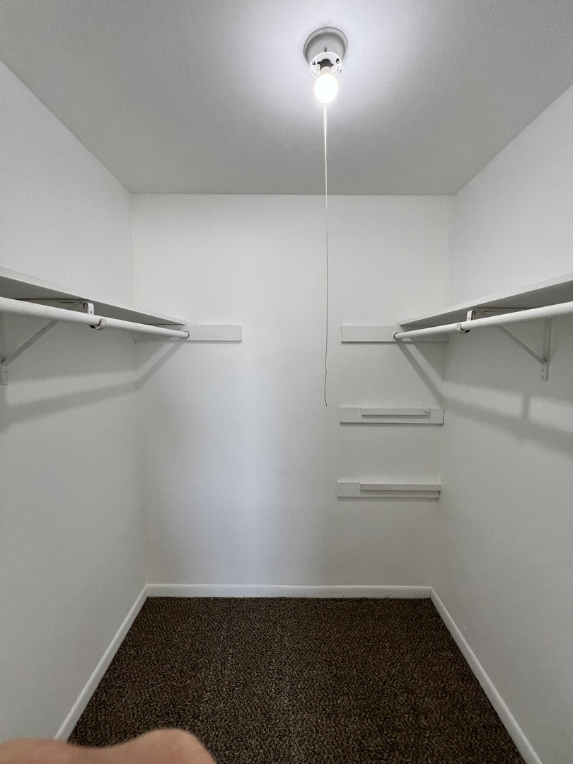 1655 Felten Road Aurora, IL 60505 - Photo 13 of 29 a view of a room with racks on the wall