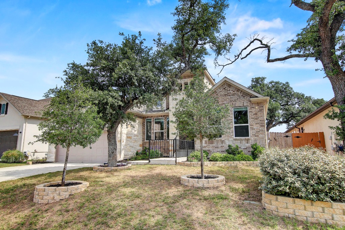 a house view with a backyard space