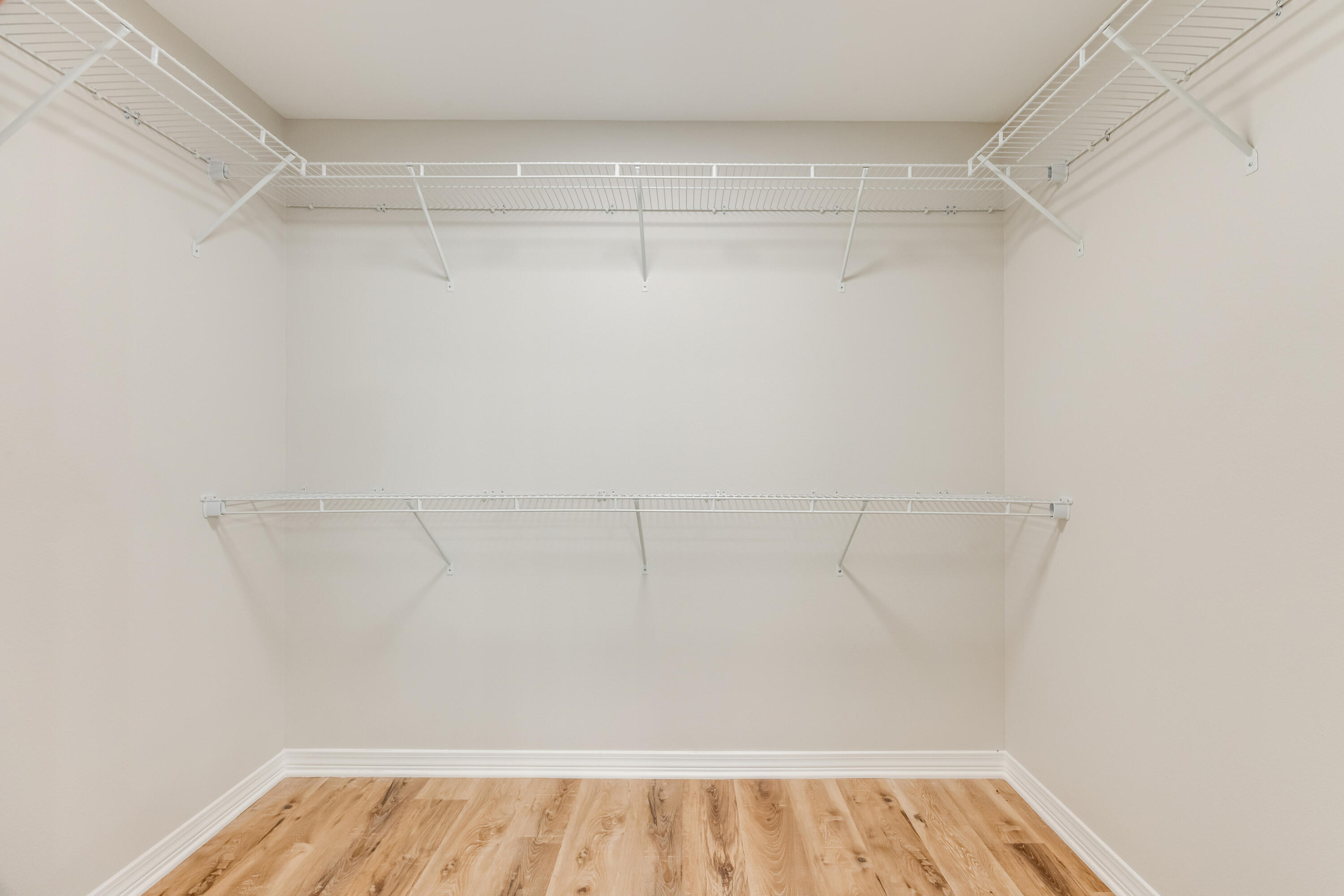 3203 Liz Court Crestview, FL 32539 - Photo 24 of 35 a view of a room with racks on the wall