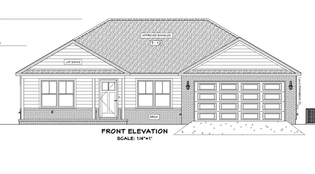 a black and white photo of a living room