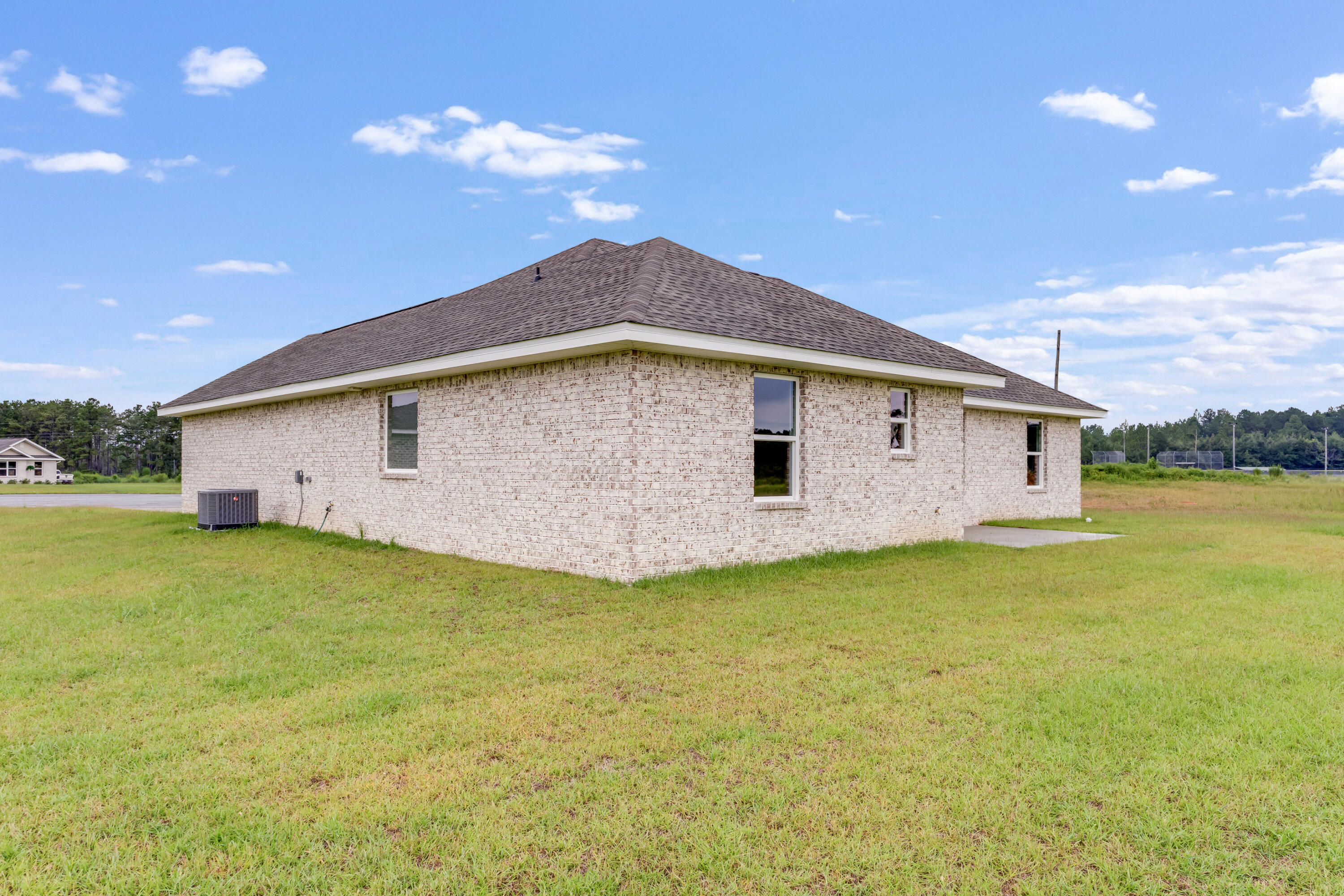 3203 Liz Court Crestview, FL 32539 - Photo 32 of 35 a view of a house with a backyard