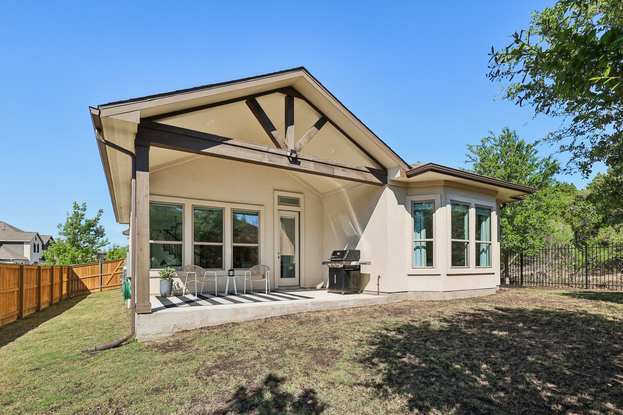 12500 Simmental Drive Austin, TX 78732 - Photo 16 of 31 a front view of a house with a yard