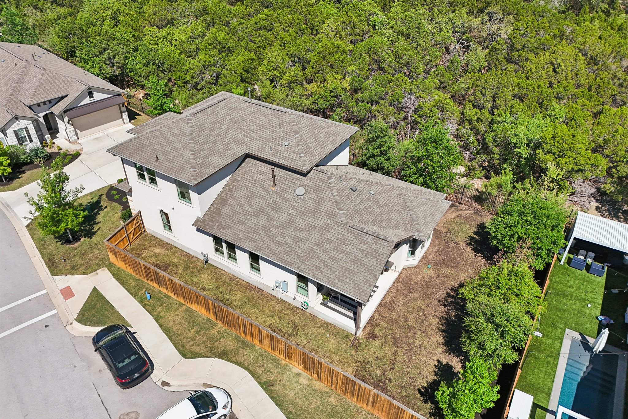 12500 Simmental Drive Austin, TX 78732 - Photo 18 of 31 an aerial view of a house with a yard and furniture