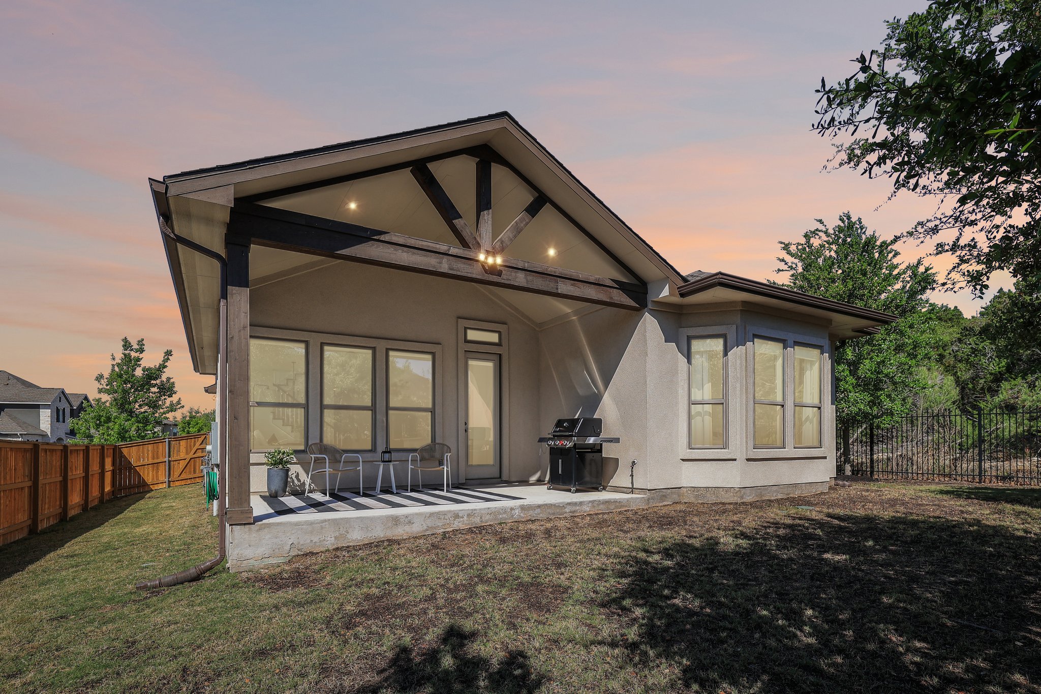 12500 Simmental Drive Austin, TX 78732 - Photo 21 of 31 a front view of a house with a yard