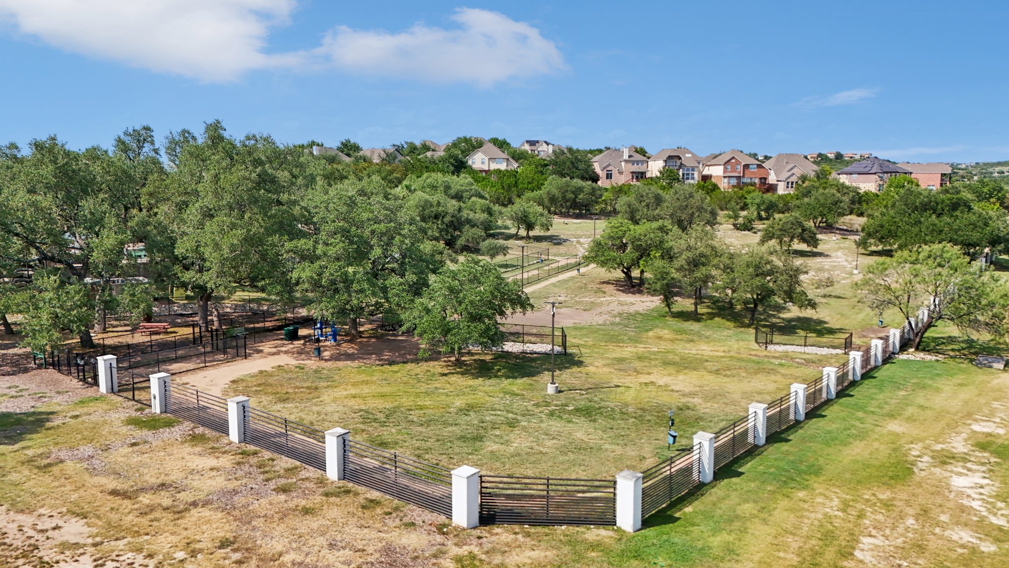 12500 Simmental Drive Austin, TX 78732 - Photo 23 of 31 a view of a backyard with swimming pool