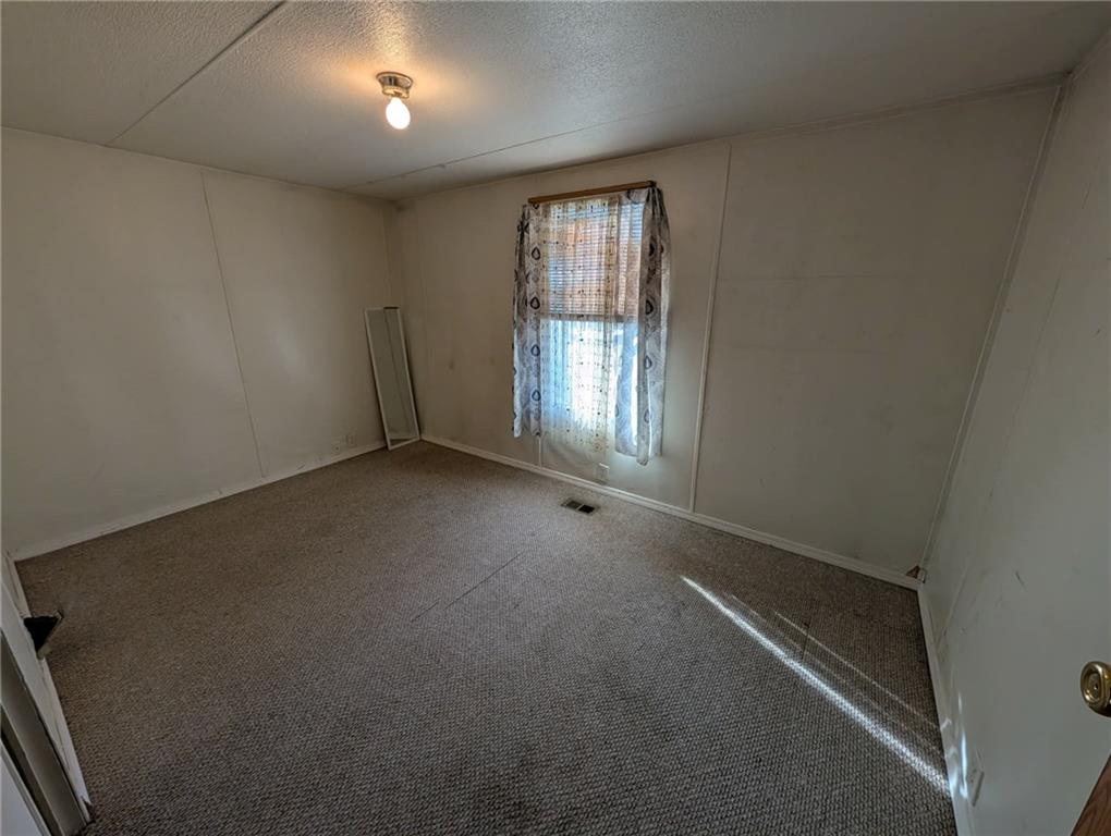 100 Santa Rita Lane Butler, PA 16001 - Photo 14 of 26 an empty room with windows