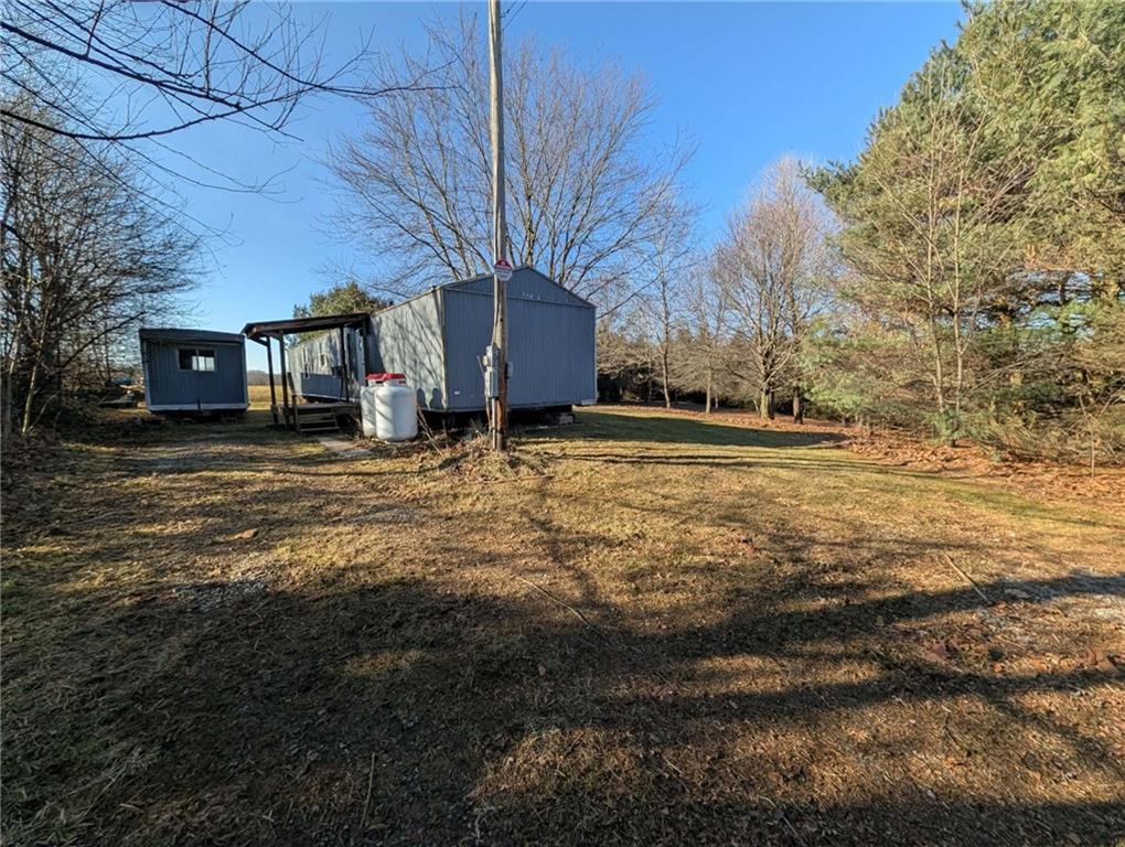 100 Santa Rita Lane Butler, PA 16001 - Photo 6 of 26 a view of a yard with a house