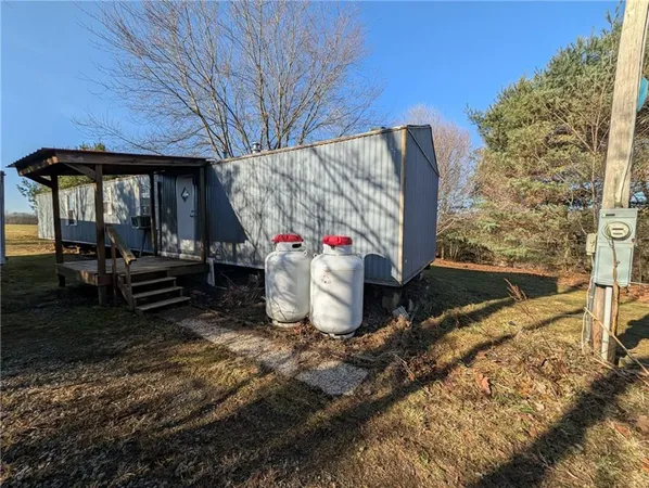 a house view with a backyard space