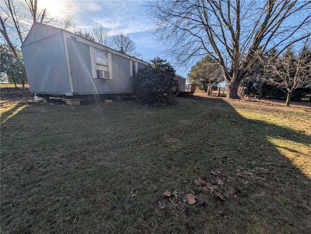 100 Santa Rita Lane Butler, PA 16001 - Photo 8 of 26 a view of a house with a yard
