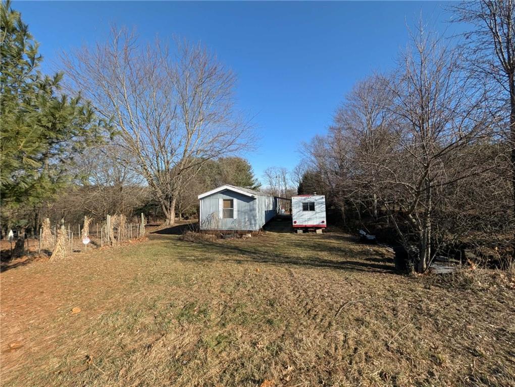 100 Santa Rita Lane Butler, PA 16001 - Photo 10 of 26 a view of a house with a yard covered in snow