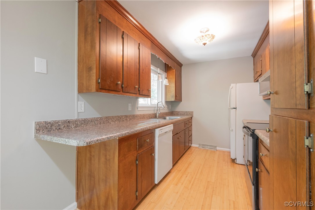 18729 Carson Road Dinwiddie, VA 23841 - Photo 8 of 49 a view of a kitchen with a sink