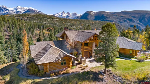 a aerial view of a house with a big yard