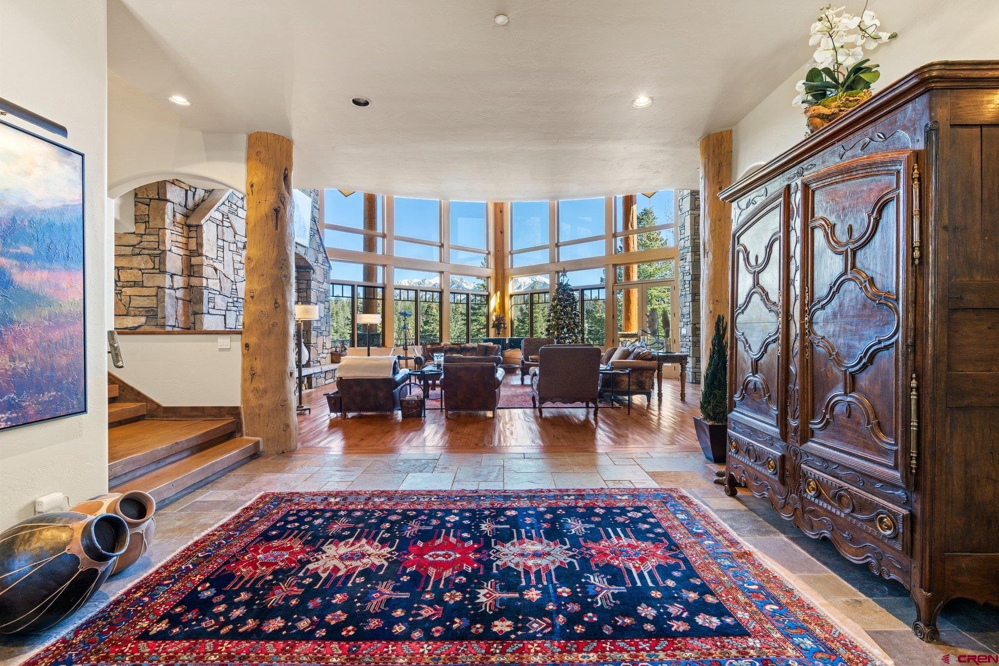 464 Pinnacle View Drive Durango, CO 81301 - Photo 5 of 35 a living room with furniture a rug and a floor to ceiling window