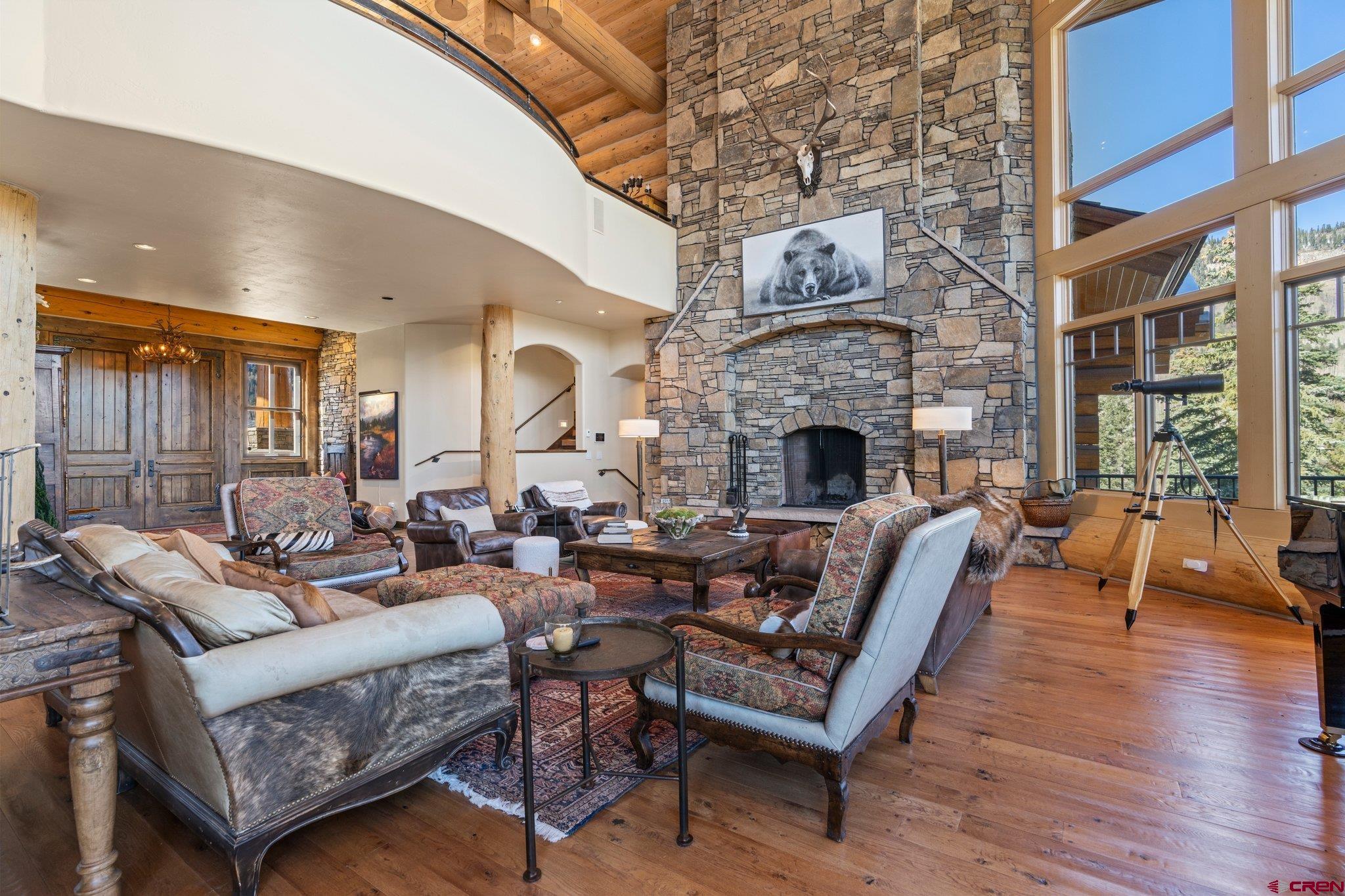 464 Pinnacle View Drive Durango, CO 81301 - Photo 7 of 35 a living room with furniture fireplace and wooden floor