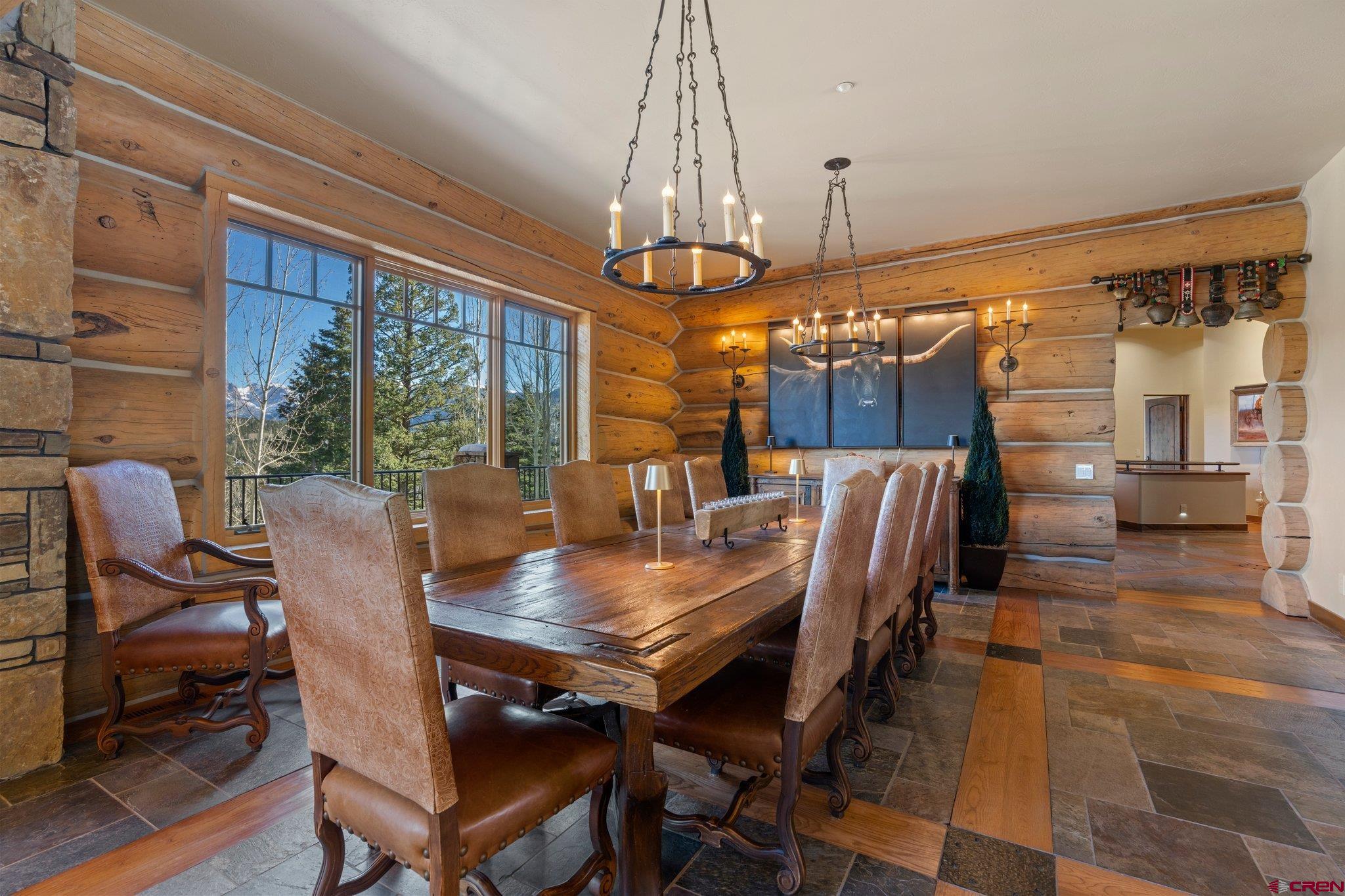 464 Pinnacle View Drive Durango, CO 81301 - Photo 9 of 35 a view of a dining room with furniture window and wooden floor