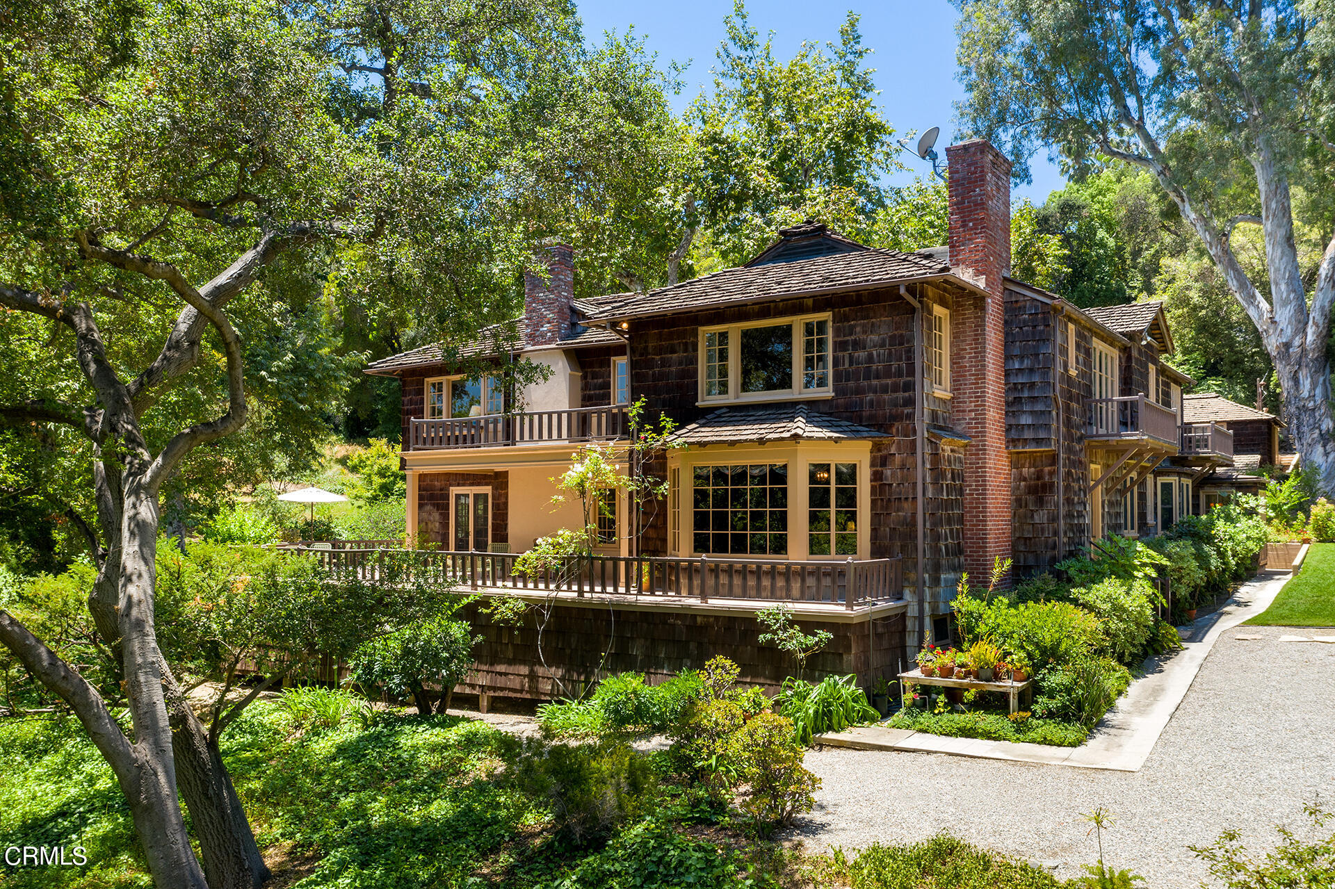 744 Rockwood Road Pasadena, CA 91105 - Photo 3 of 43 a front view of a house with a yard
