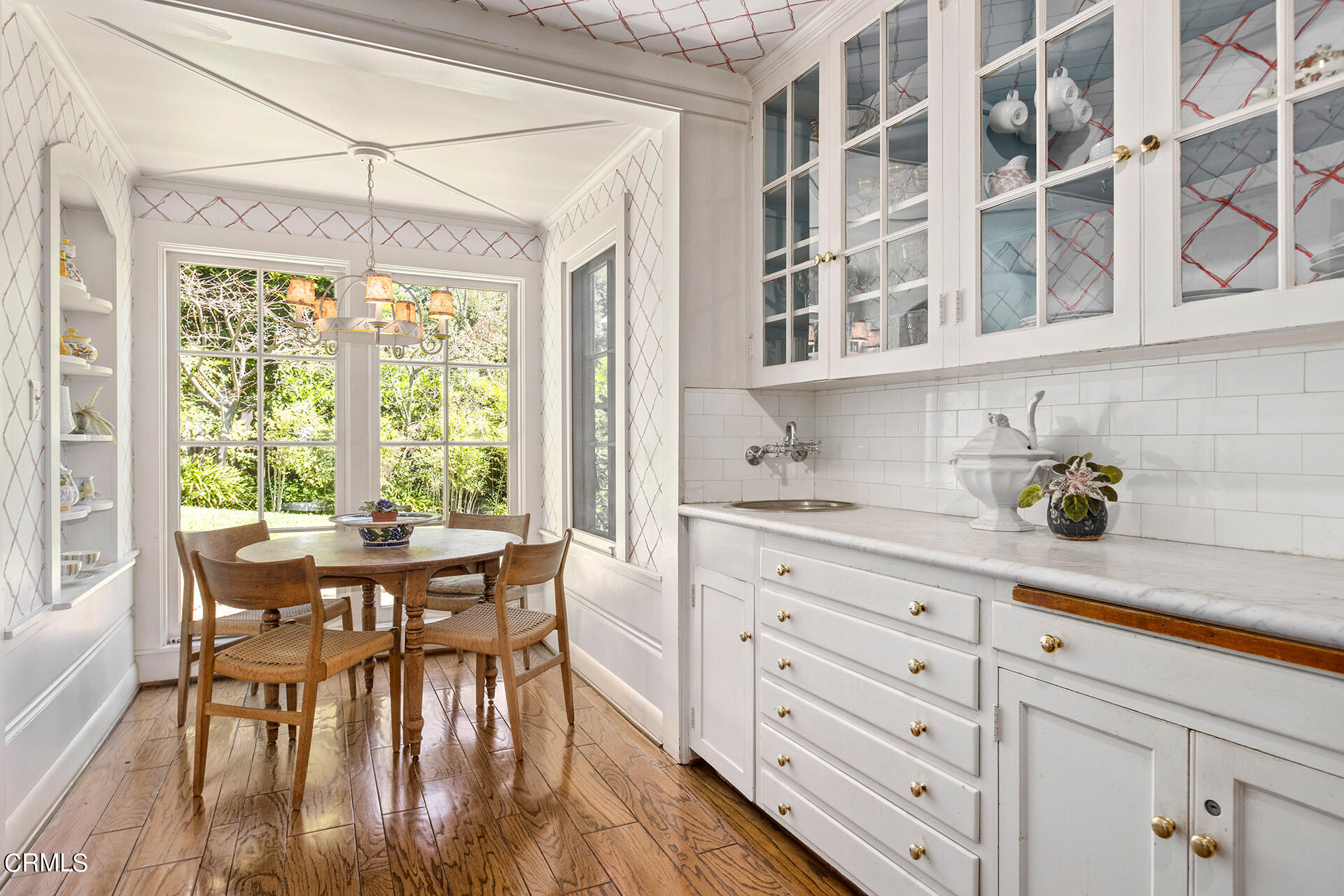 744 Rockwood Road Pasadena, CA 91105 - Photo 22 of 43 a view of a dining room with furniture and chandelier