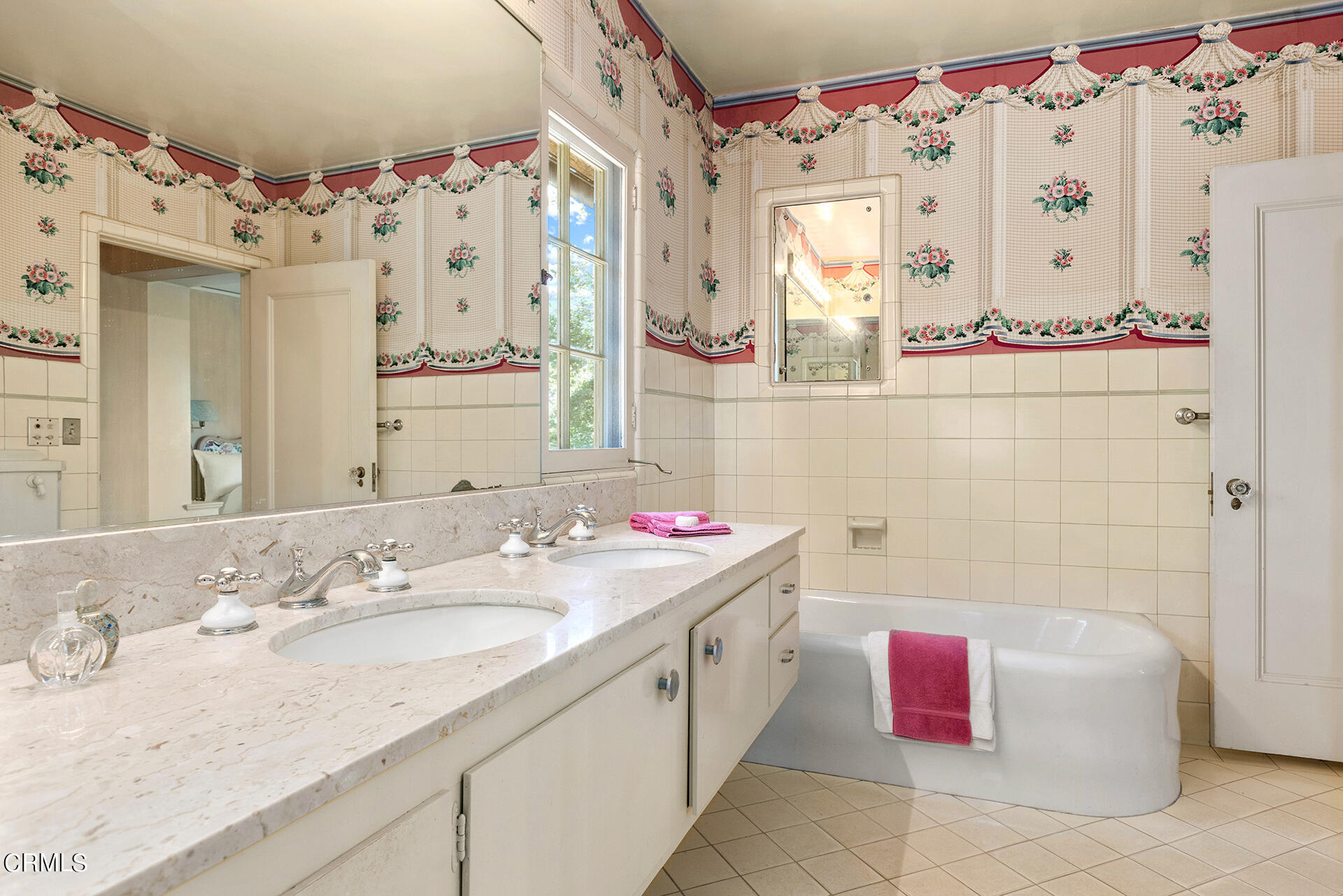 744 Rockwood Road Pasadena, CA 91105 - Photo 26 of 43 a bathroom with a sink mirror and vanity