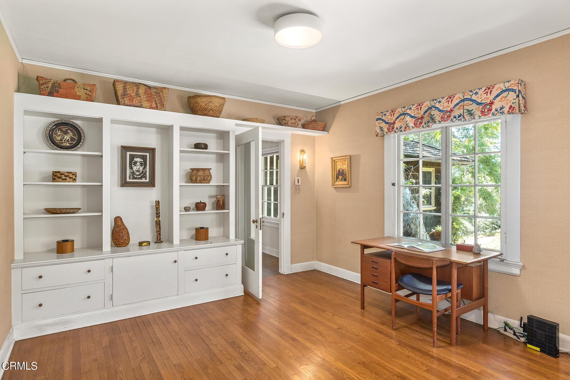 744 Rockwood Road Pasadena, CA 91105 - Photo 27 of 43 a living room with furniture and wooden floor