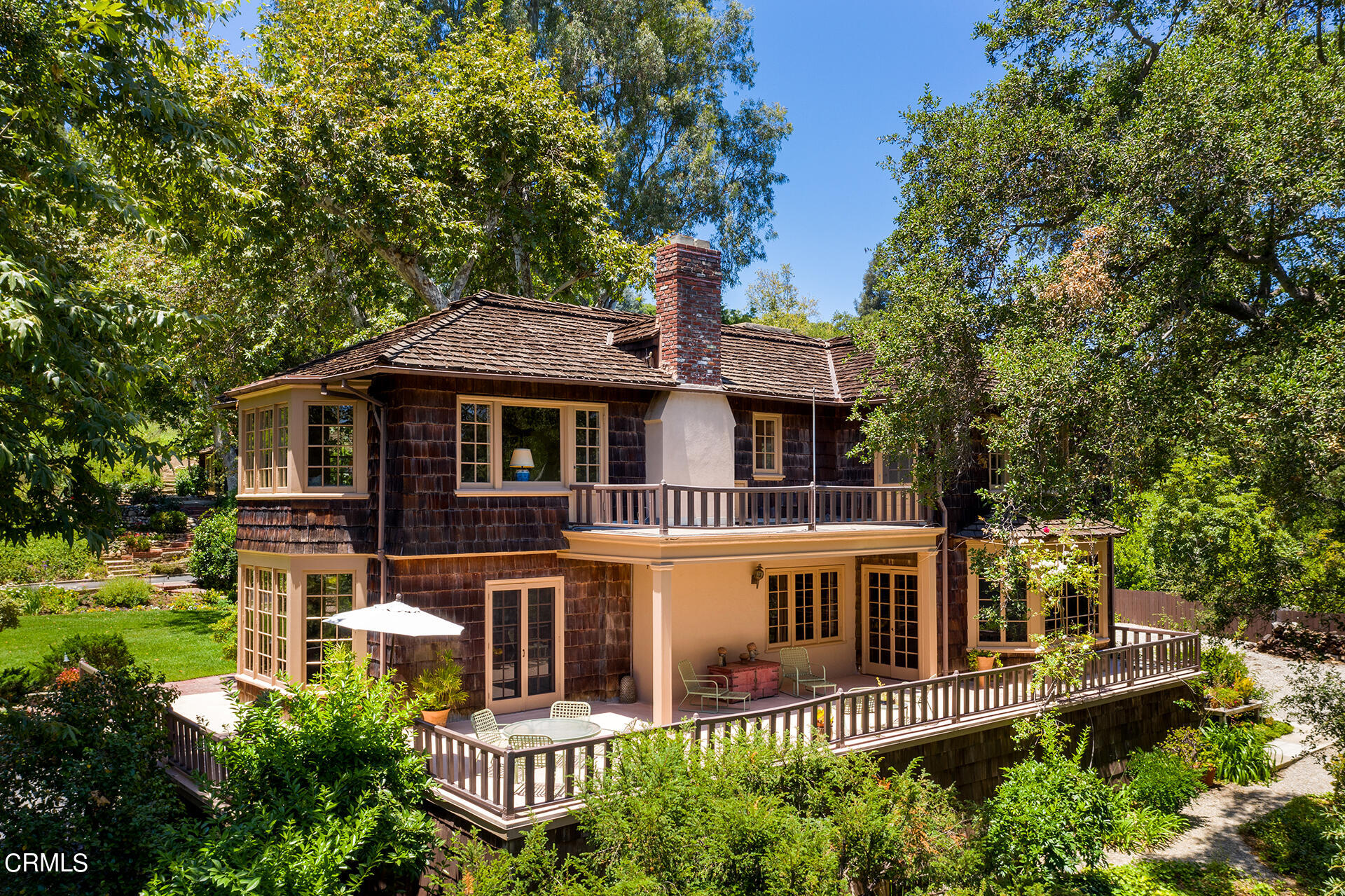 744 Rockwood Road Pasadena, CA 91105 - Photo 4 of 43 a front view of a house with a yard balcony
