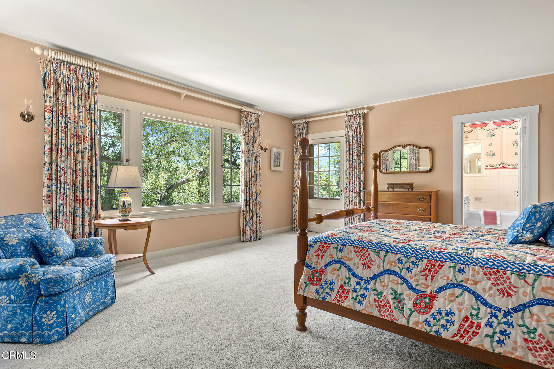 744 Rockwood Road Pasadena, CA 91105 - Photo 32 of 43 a bedroom with a bed couch and two large window