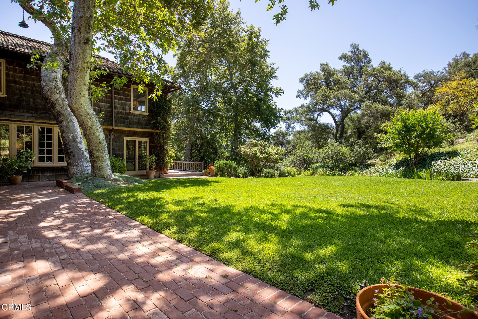 744 Rockwood Road Pasadena, CA 91105 - Photo 39 of 43 a view of house with garden space and trees