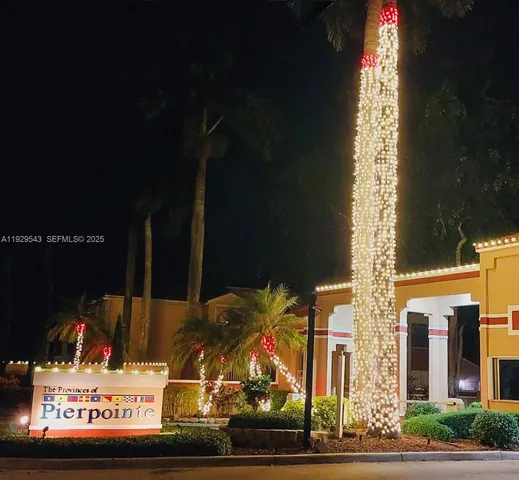 a view of a street with sign board
