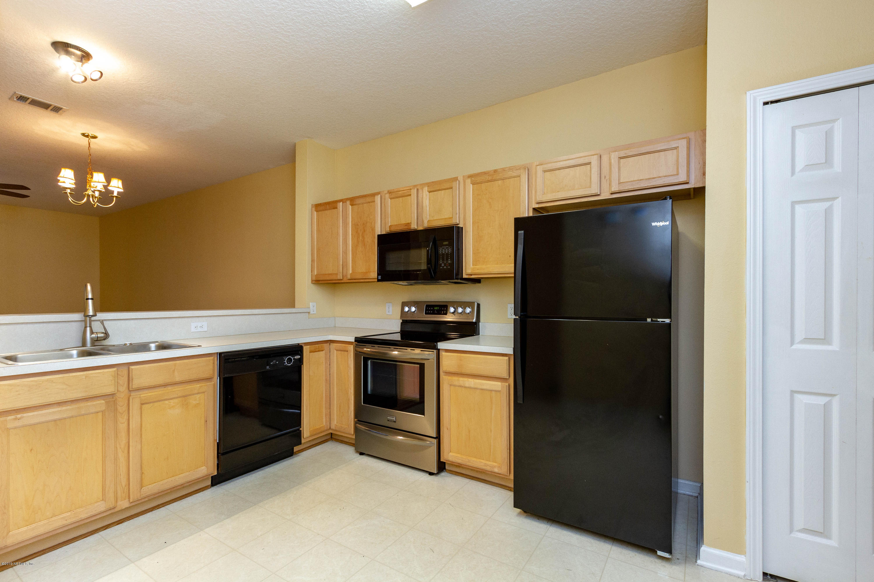 7859 Melvin Road Jacksonville, FL 32210 - Photo 11 of 29 Kitchen View 2
