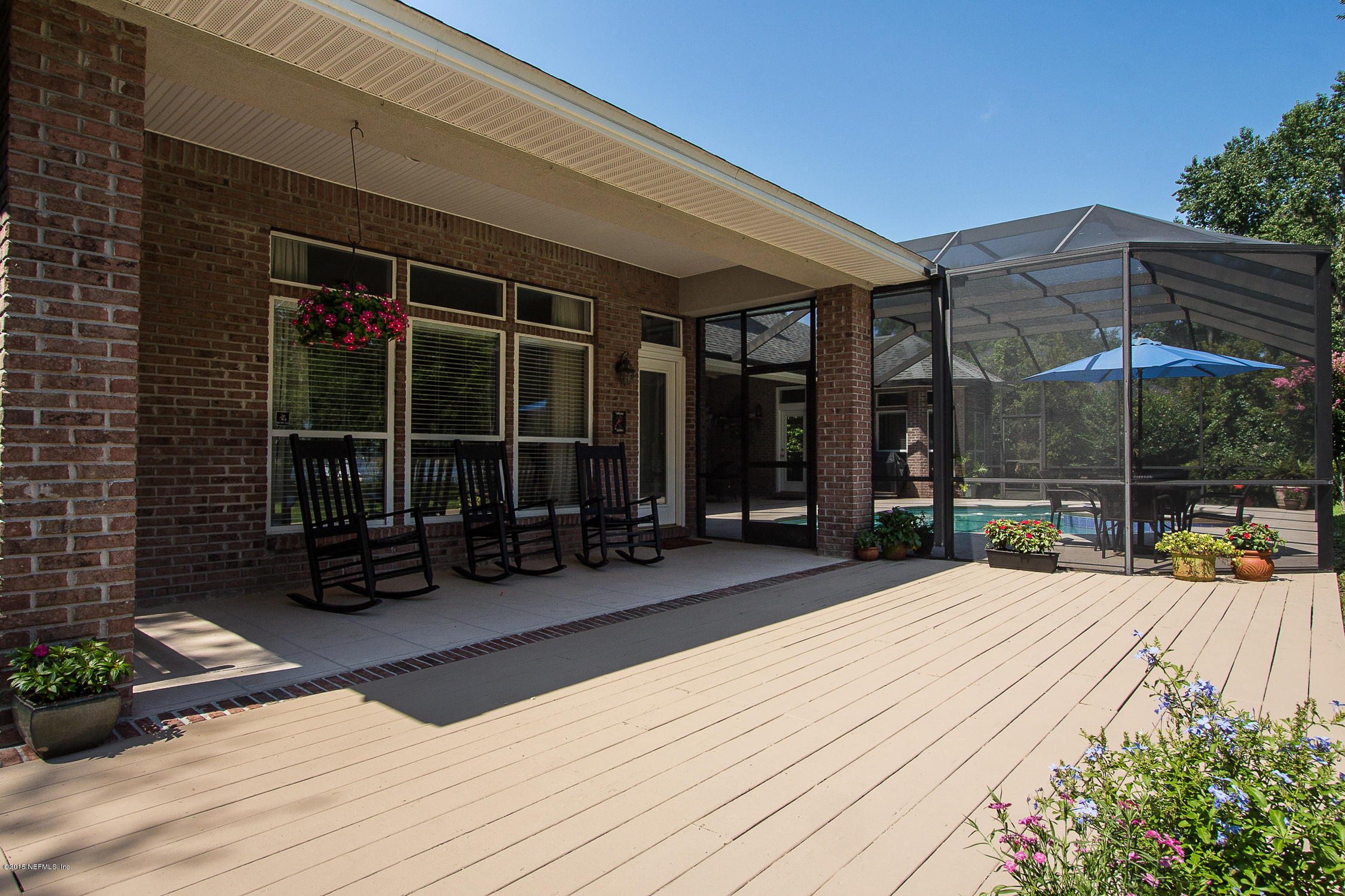 3122 Nautilus Road Middleburg, FL 32068 - Photo 55 of 64 a view of a house with backyard porch and sitting area