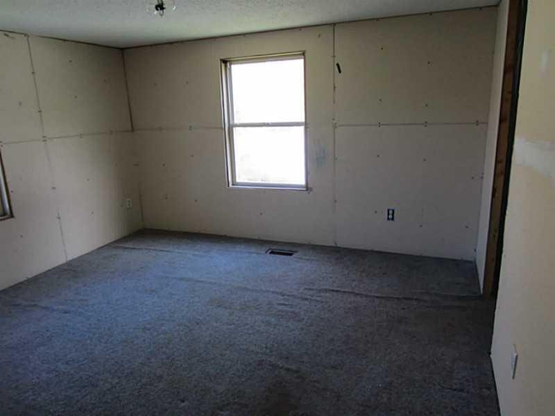 49 Maple Street Milford, ME 04461 - Photo 11 of 17 Living Room.