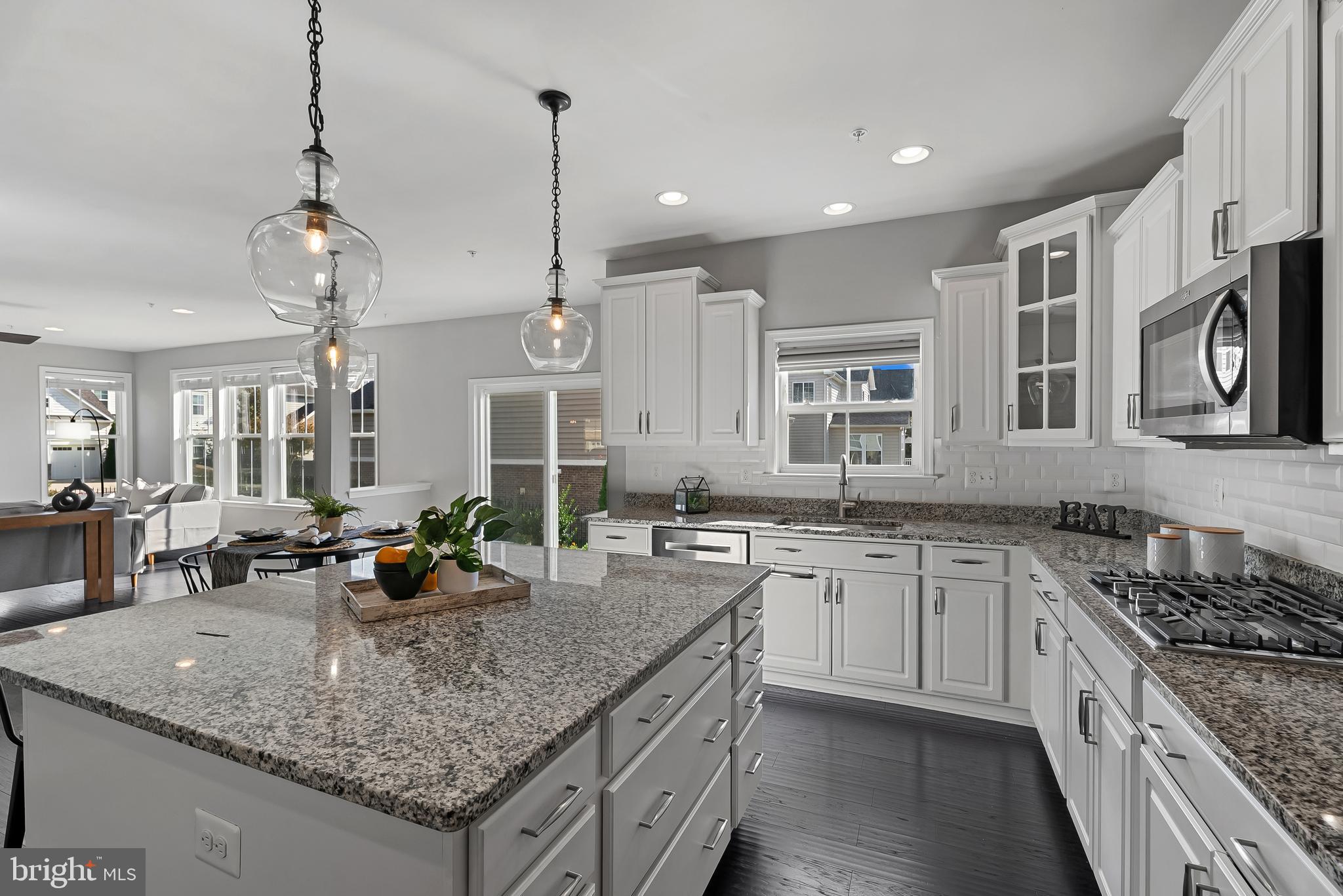 815 Holden Road Frederick, MD 21701 - Photo 19 of 59 a kitchen with center island a sink appliances and cabinets