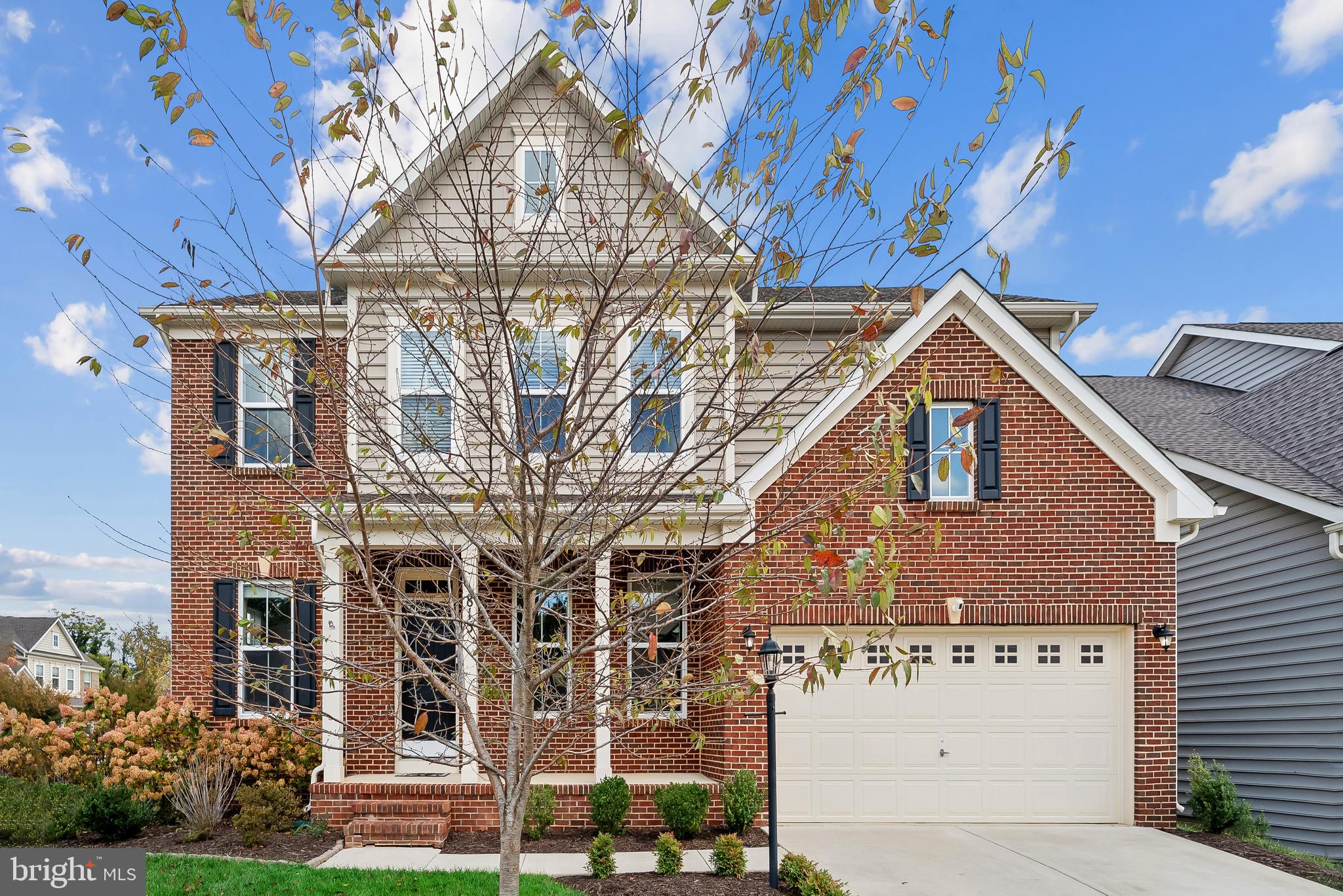 815 Holden Road Frederick, MD 21701 - Photo 2 of 59 a view of a brick house with a yard