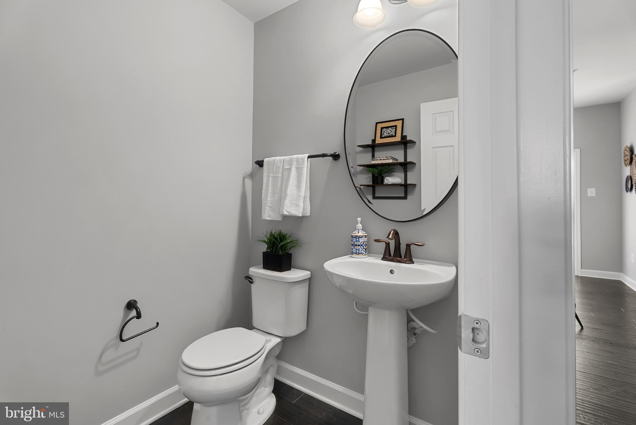 815 Holden Road Frederick, MD 21701 - Photo 21 of 59 a bathroom with a sink toilet and mirror