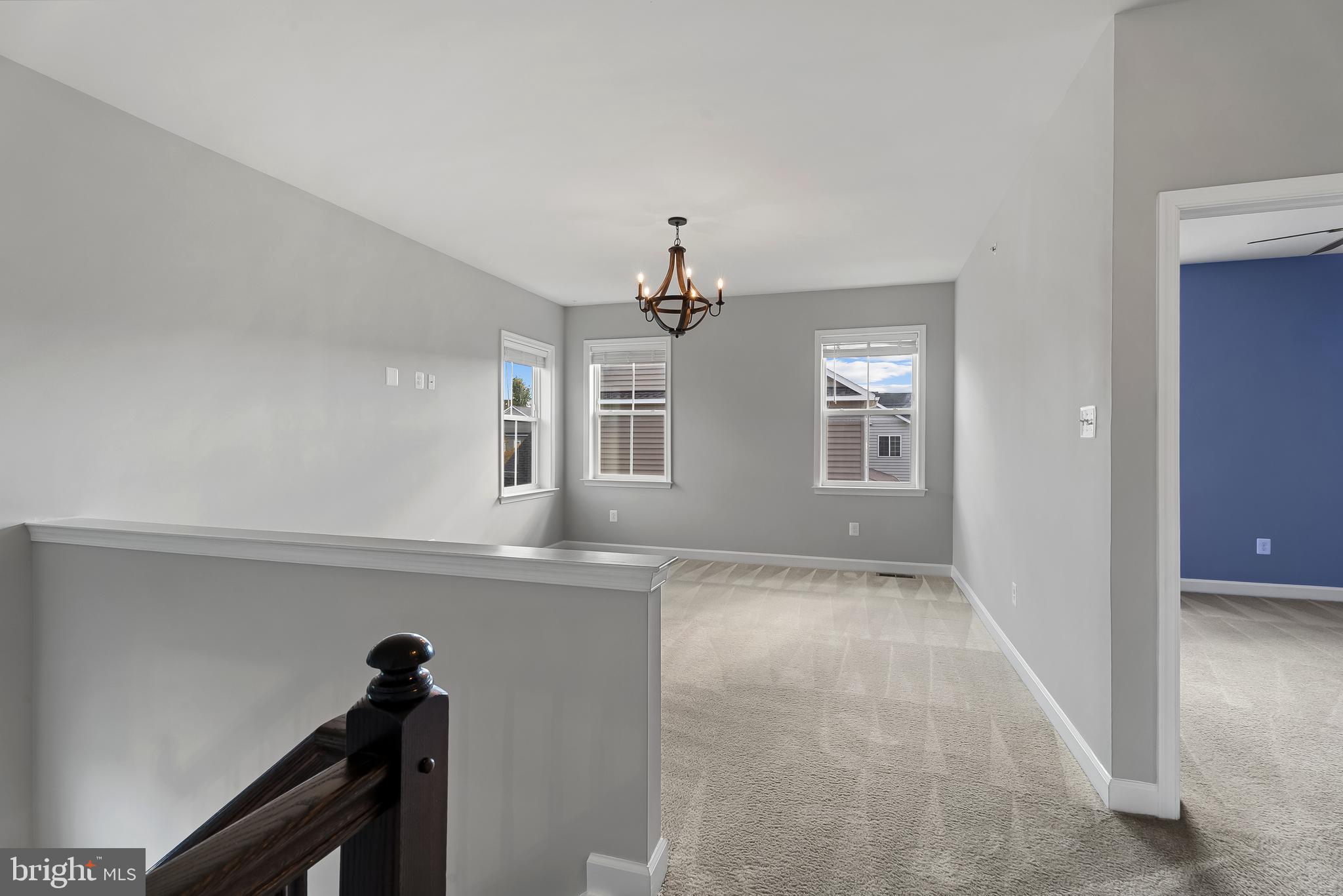 815 Holden Road Frederick, MD 21701 - Photo 22 of 59 a view of a hallway with windows