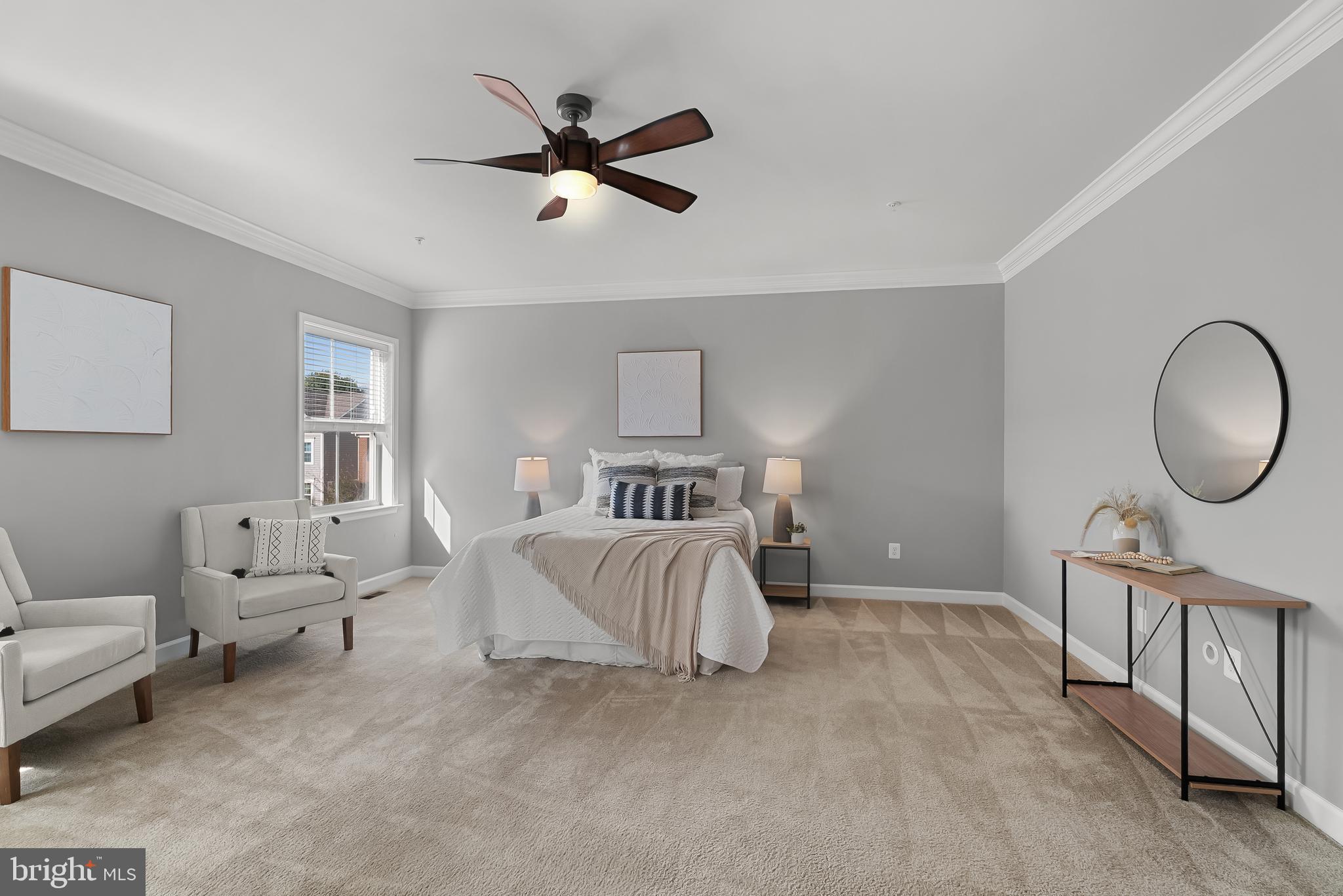 815 Holden Road Frederick, MD 21701 - Photo 25 of 59 a spacious bedroom with a bed and window