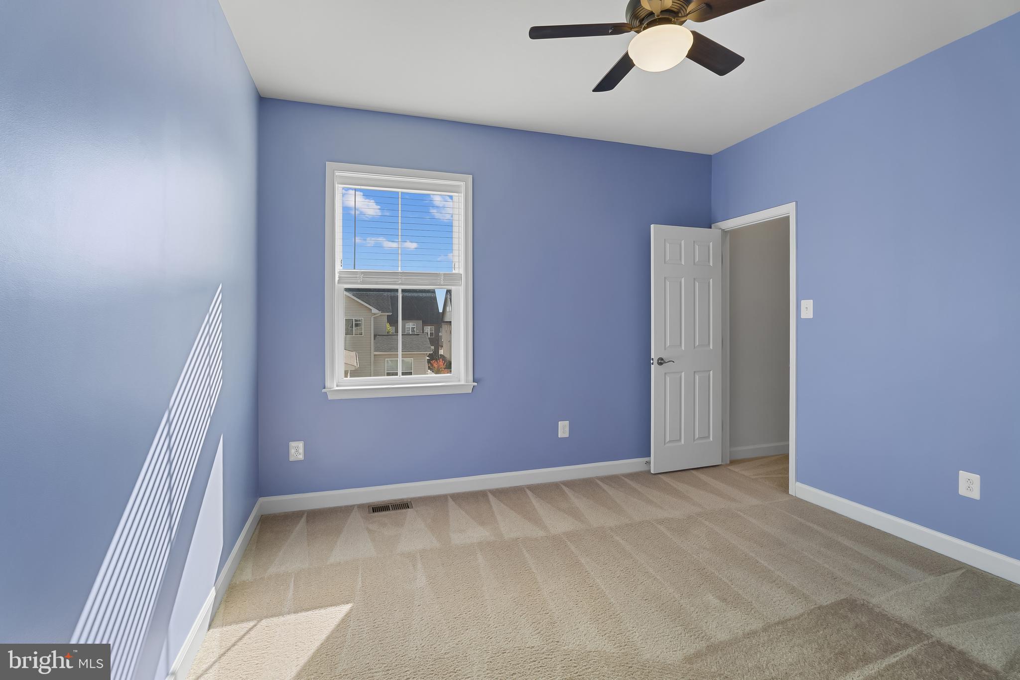 815 Holden Road Frederick, MD 21701 - Photo 32 of 59 a view of an empty room with a window