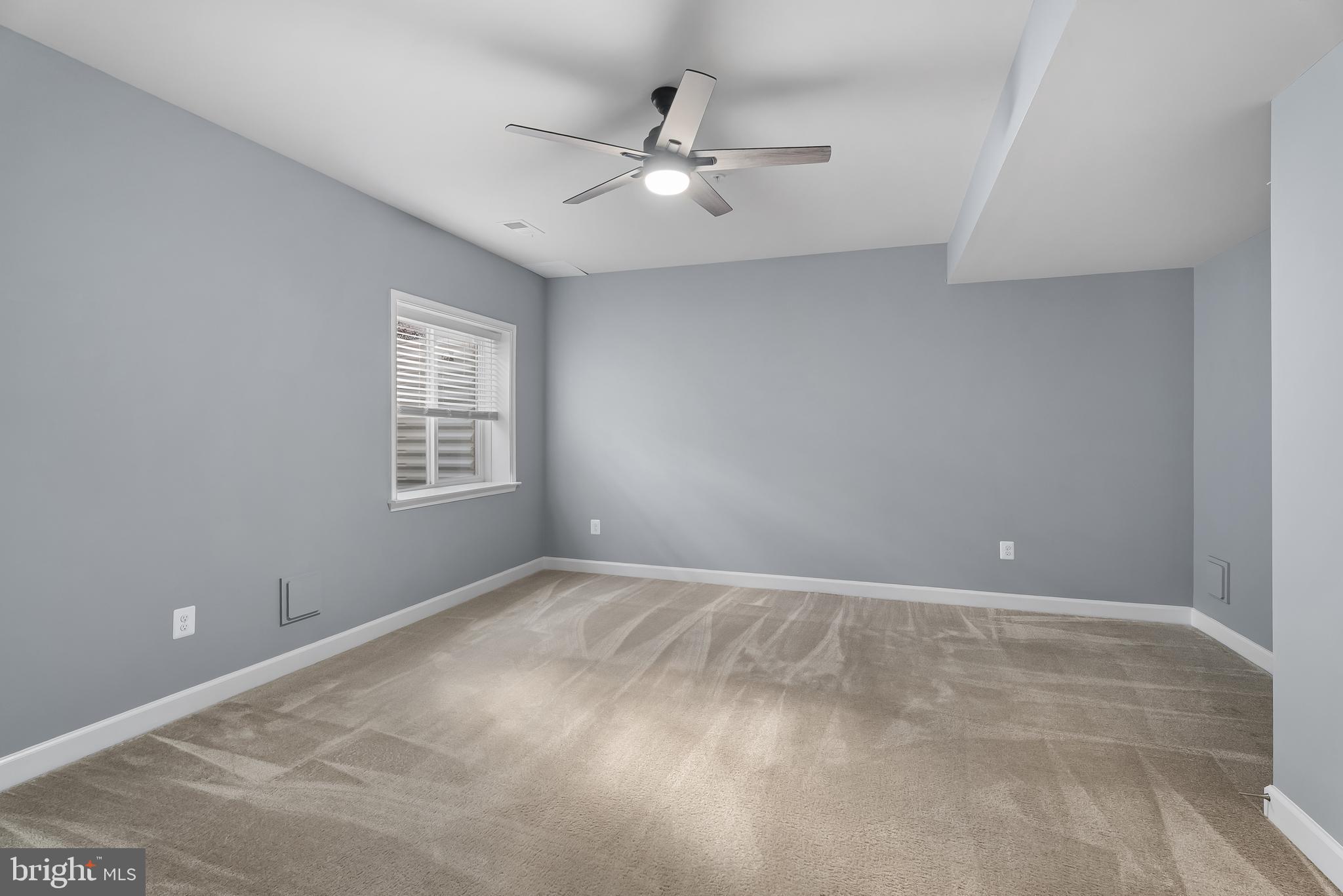 815 Holden Road Frederick, MD 21701 - Photo 39 of 59 a view of an empty room with a window