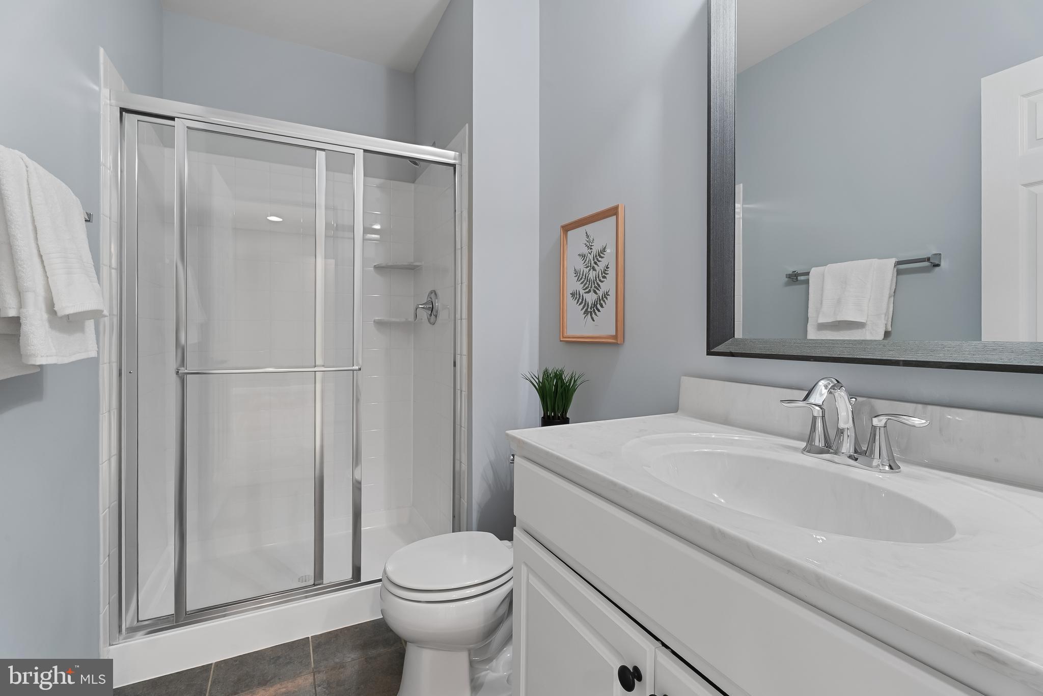 815 Holden Road Frederick, MD 21701 - Photo 41 of 59 a bathroom with a sink toilet and shower