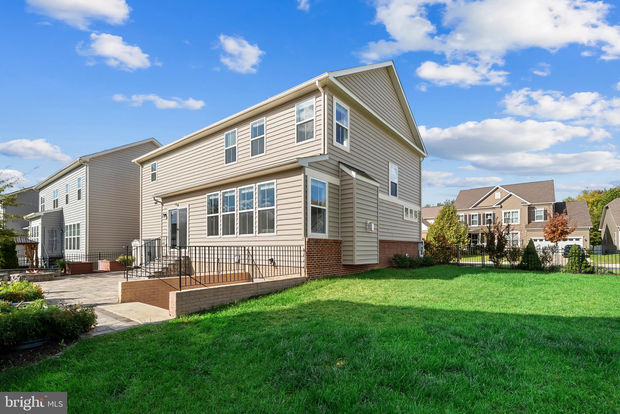 815 Holden Road Frederick, MD 21701 - Photo 49 of 59 a front view of a house with a yard