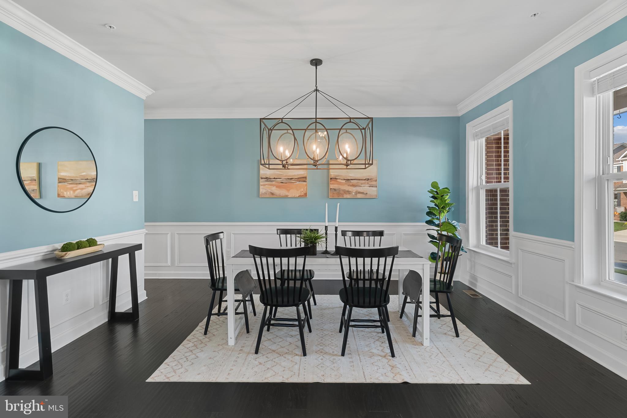 815 Holden Road Frederick, MD 21701 - Photo 8 of 59 a view of a dining room with furniture window and wooden floor