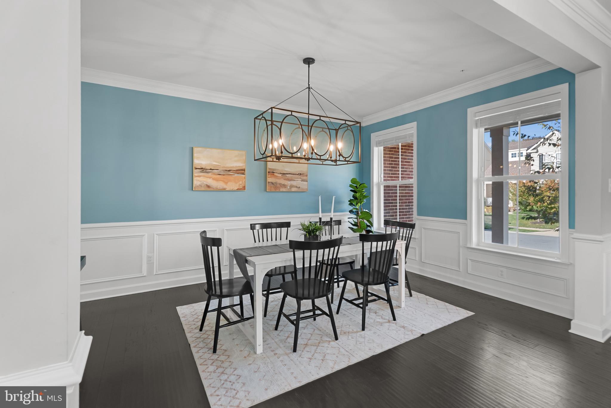 815 Holden Road Frederick, MD 21701 - Photo 9 of 59 a view of a dining room with furniture window and wooden floor