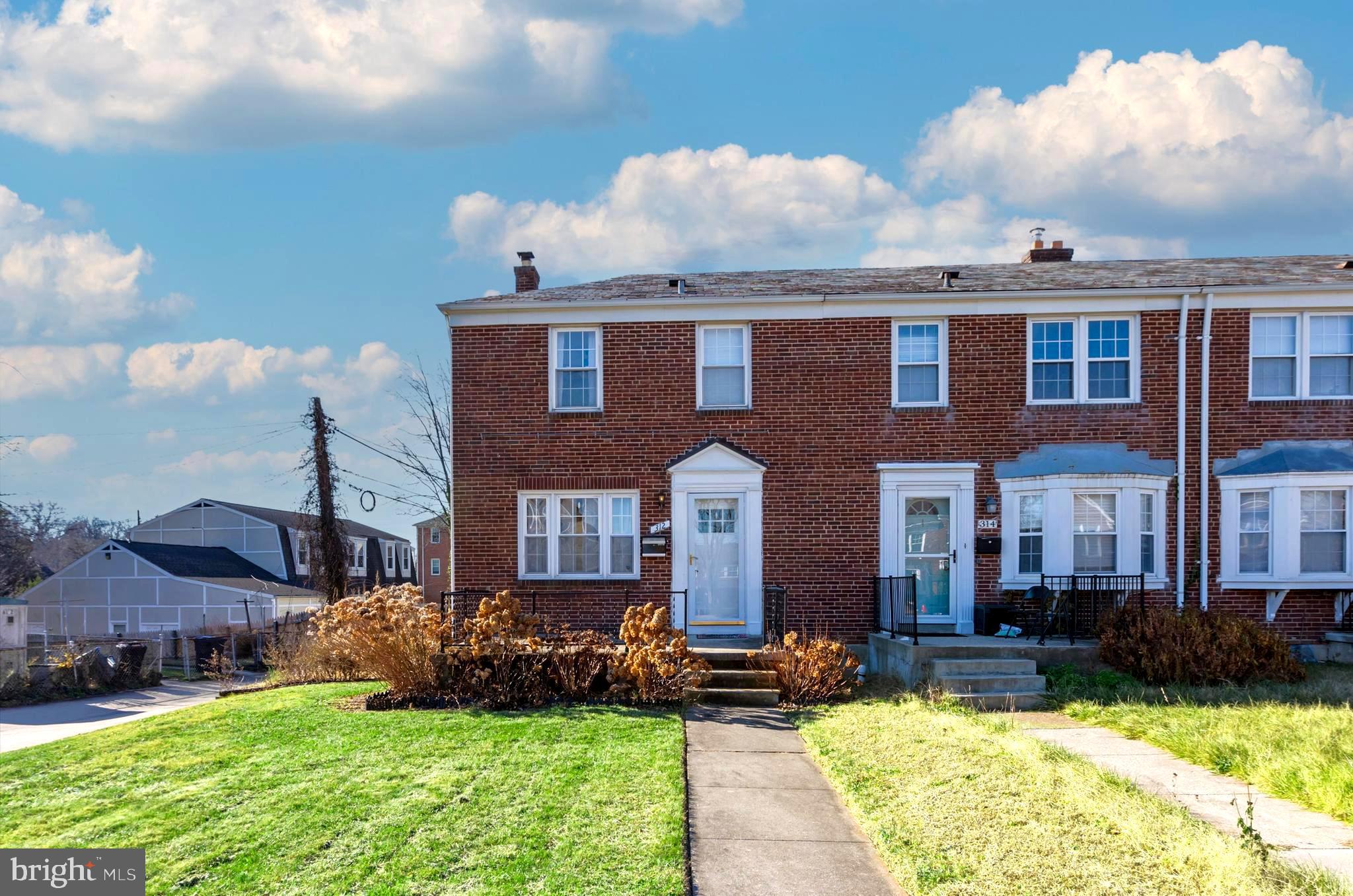 312 Small Court Catonsville, MD 21228 - Photo 2 of 41 a front view of a house with a yard