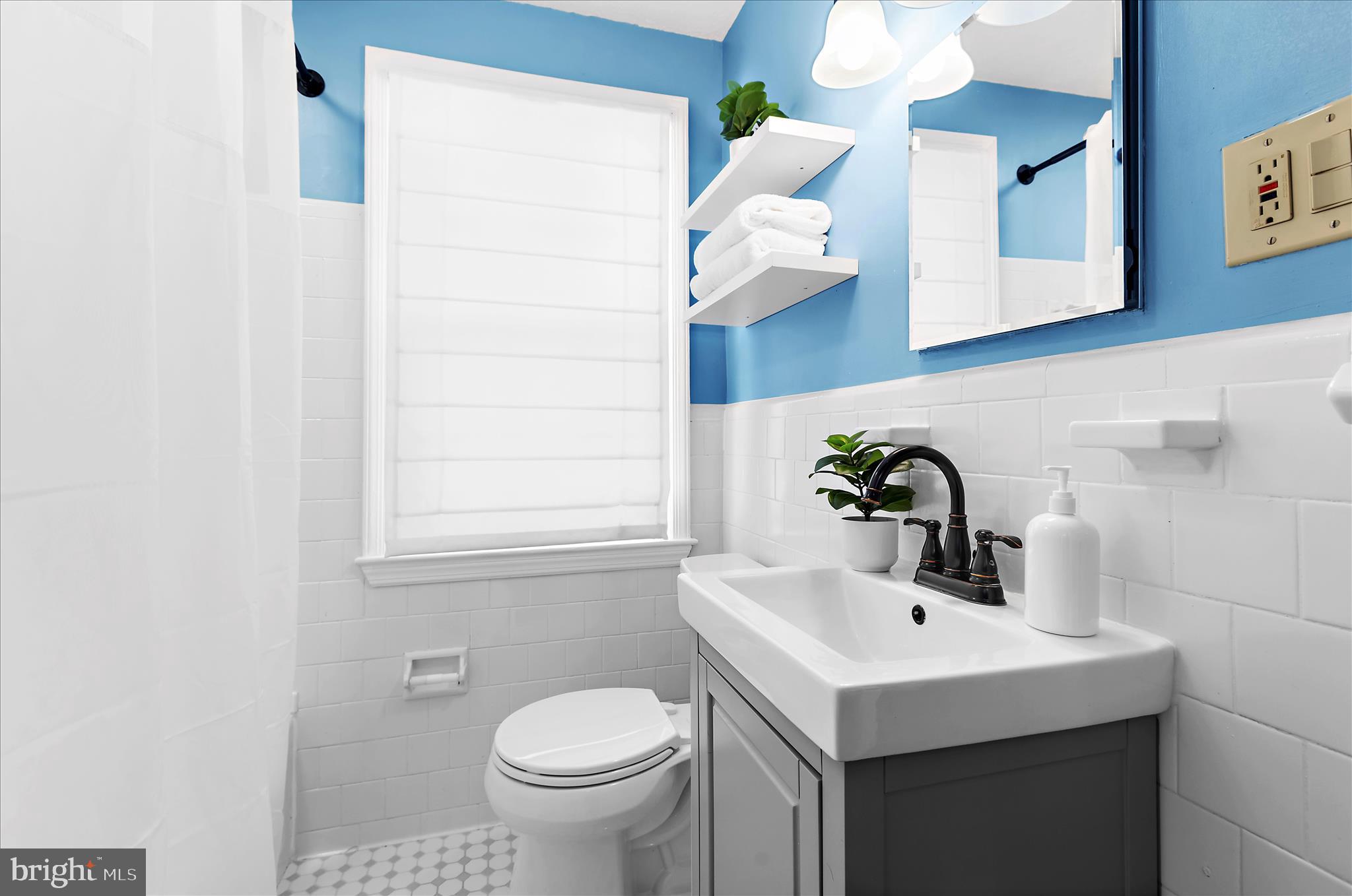 312 Small Court Catonsville, MD 21228 - Photo 28 of 41 a bathroom with a sink and a toilet