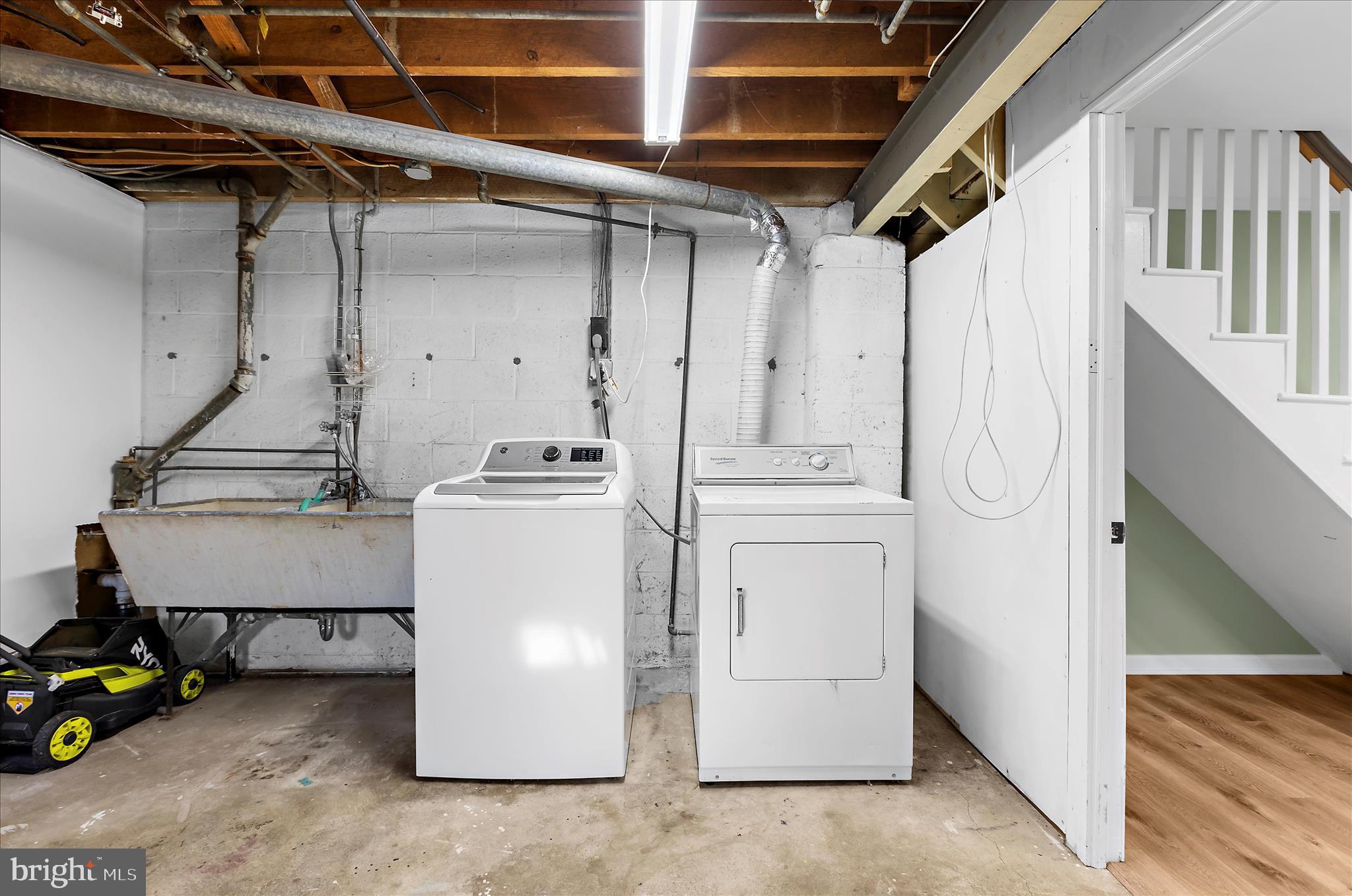 312 Small Court Catonsville, MD 21228 - Photo 36 of 41 a utility room with dryer and washer